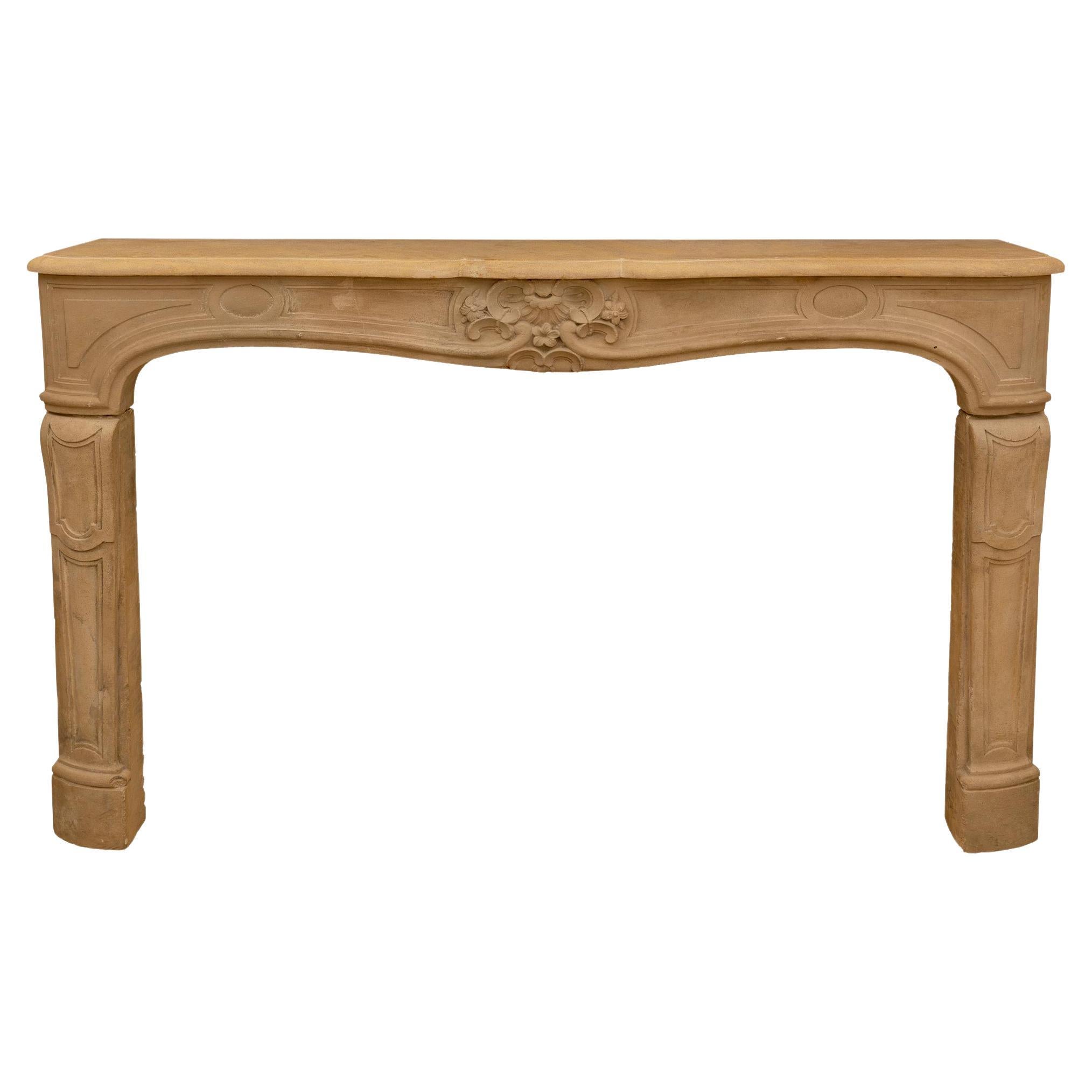 French Early 19th Century Louis XV Style Limestone Fireplace Mantel For Sale