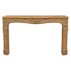 French Early 19th Century Louis XV Style Limestone Fireplace Mantel