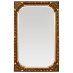 French Early 19th Century Louis XVI St. Patinated Wood and Giltwood Mirror