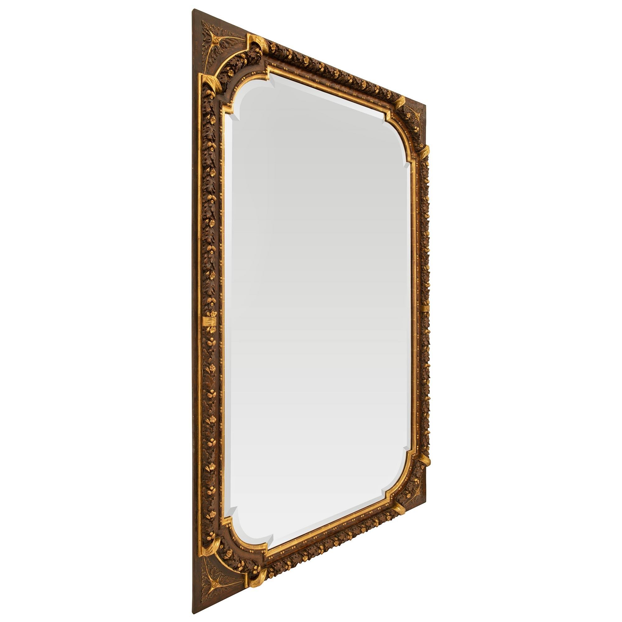 French Early 19th Century Louis XVI St. Patinated Wood and Giltwood Mirror In Good Condition For Sale In West Palm Beach, FL