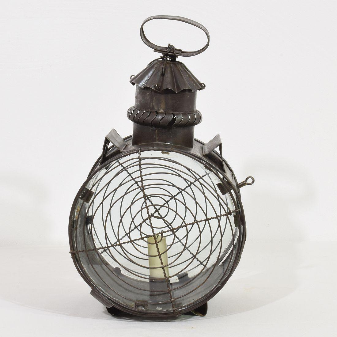 Very rare metal lantern, France, circa 1800- 1850.

Weathered and some old repairs. Glass of later date.