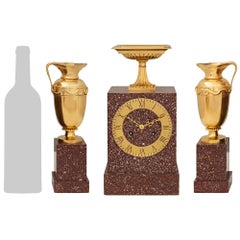 French early 19th century Porphyry and Ormolu garniture Clock Set
