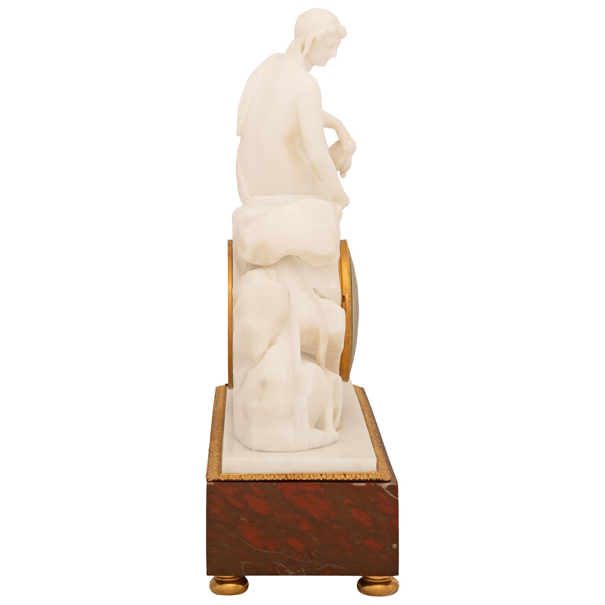 French early 19th century white Carrara, Griotte marble and Ormolu clock In Good Condition For Sale In West Palm Beach, FL