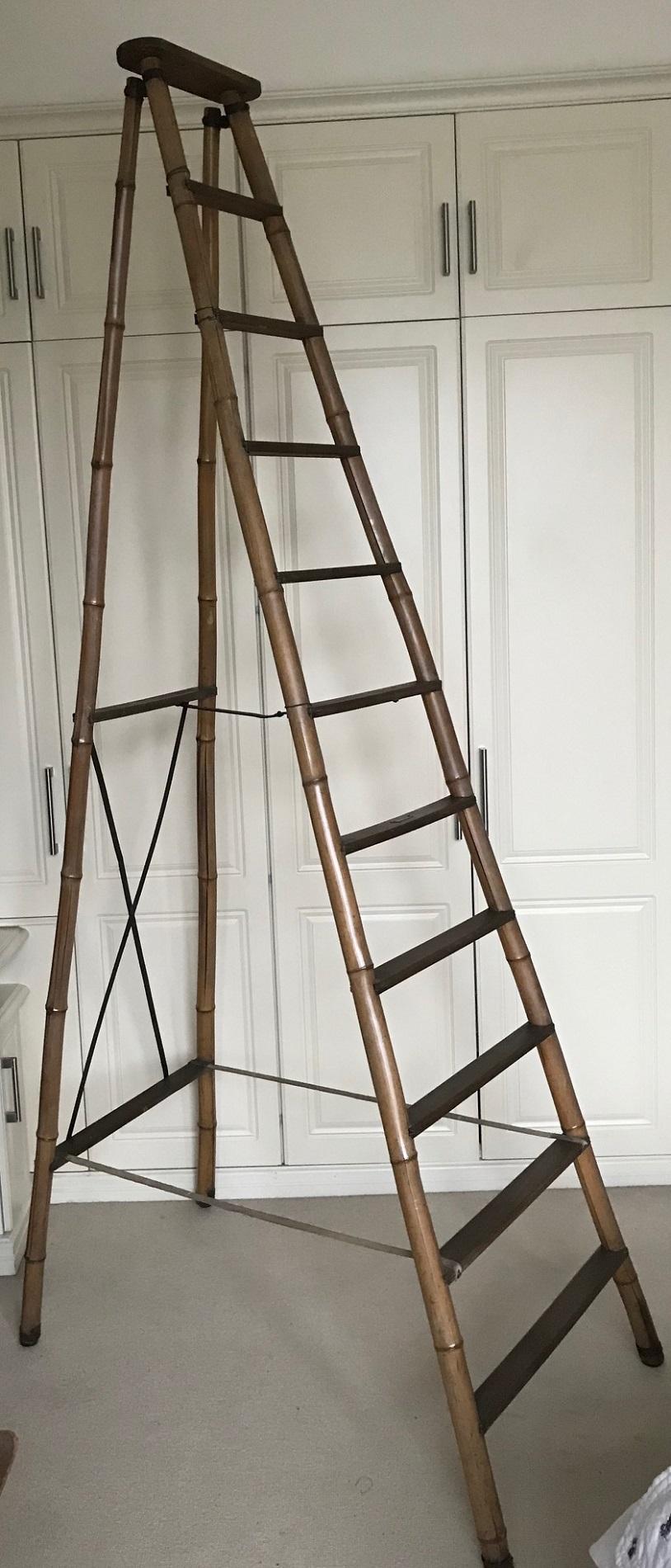 A fantastic pair of tall bamboo French ladders/makers stamp Dijon France. All original. Some damage/splits to the bamboo so not recommended for daily use, though stabile and strong. Wonderful rare decorative object, which would suit a large studio