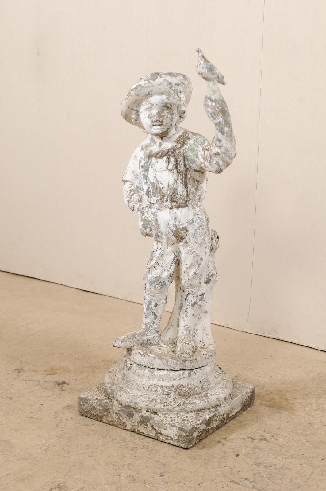 French Antique Cast-Stone Garden Sculpture of Boy with Bird, 4+ Ft in Height In Good Condition For Sale In Atlanta, GA