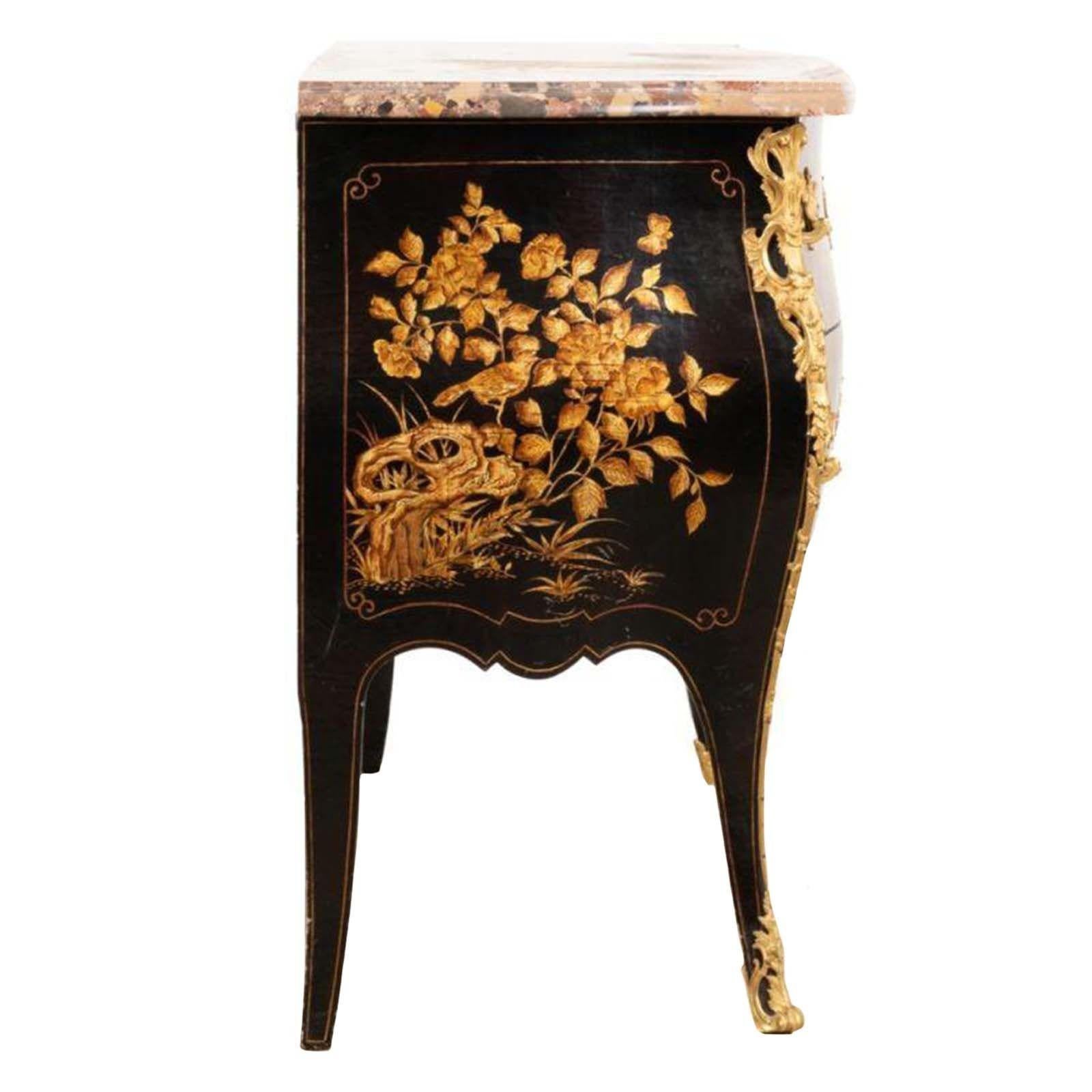 French Coromandel style ebonized bombé commode with a quality Breche d' Alep marble top and beautiful gilt motif. Made in France, 1900.
Dimensions:
34.5