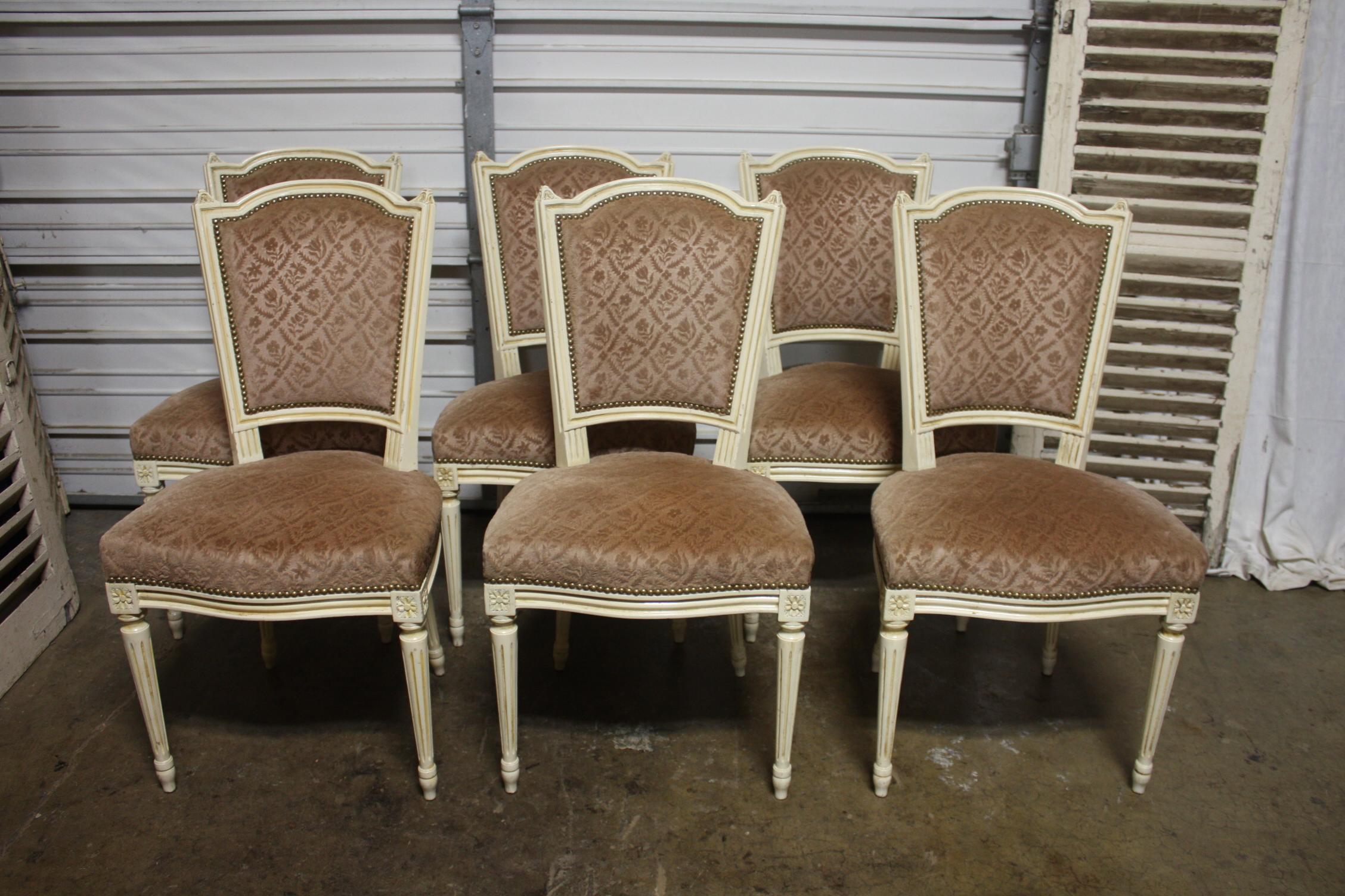 Very charming French dining room chairs with a nice design of the Louis XVI style. They are strong and sturdy.