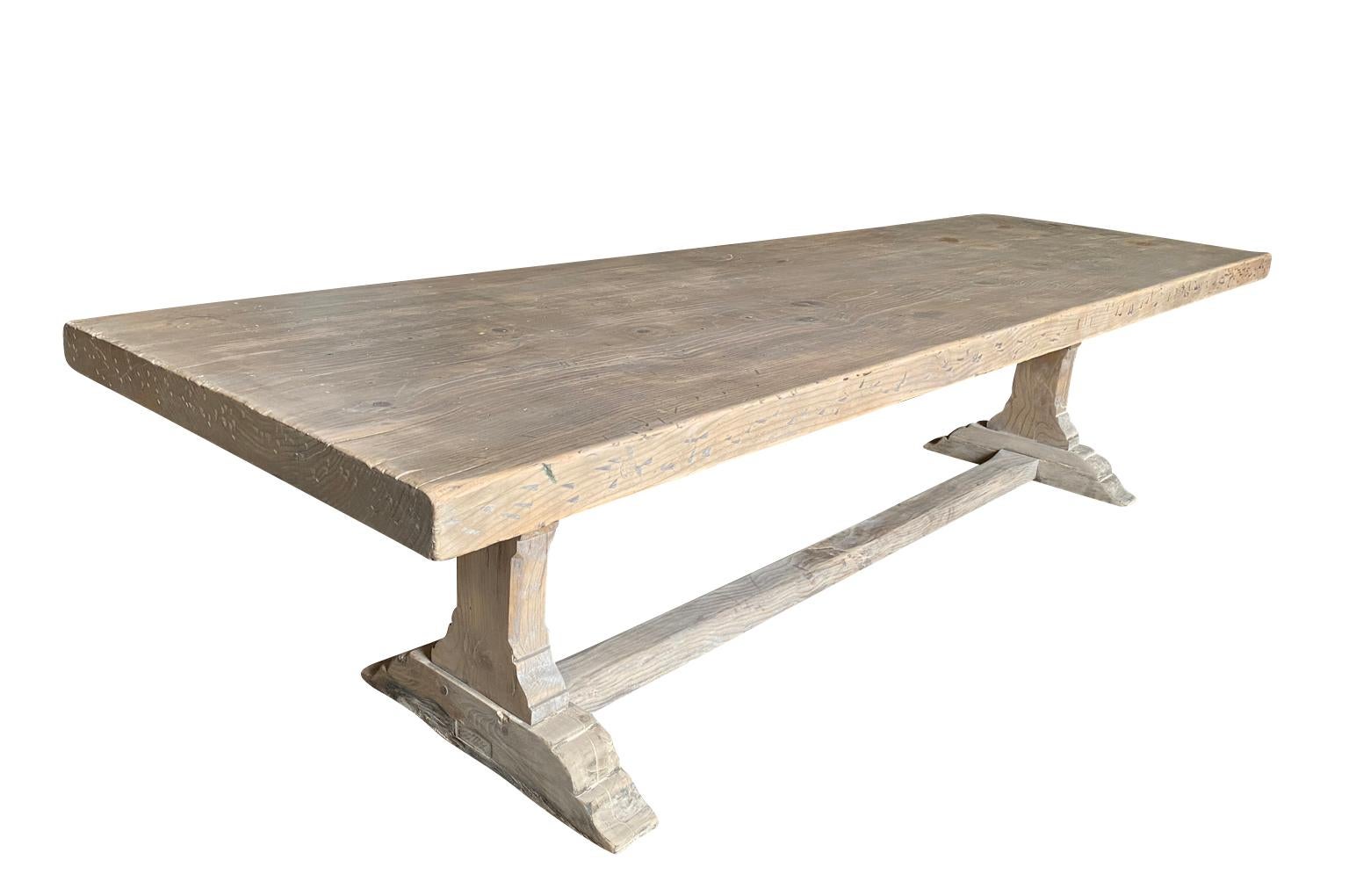 A very handsome early 20th century Farm House - Trestle Table from the Provence region of France.  Soundly constructed from beautiful chestnut and beech with a lovely trestle base and a solid board top.  Wonderful for large gatherings.