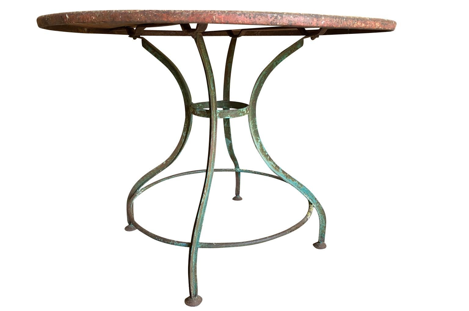 A lovely French early 20th century Garden Gueridon from the South of  France.  Soundly constructed from painted iron.  Nice larger scale.
