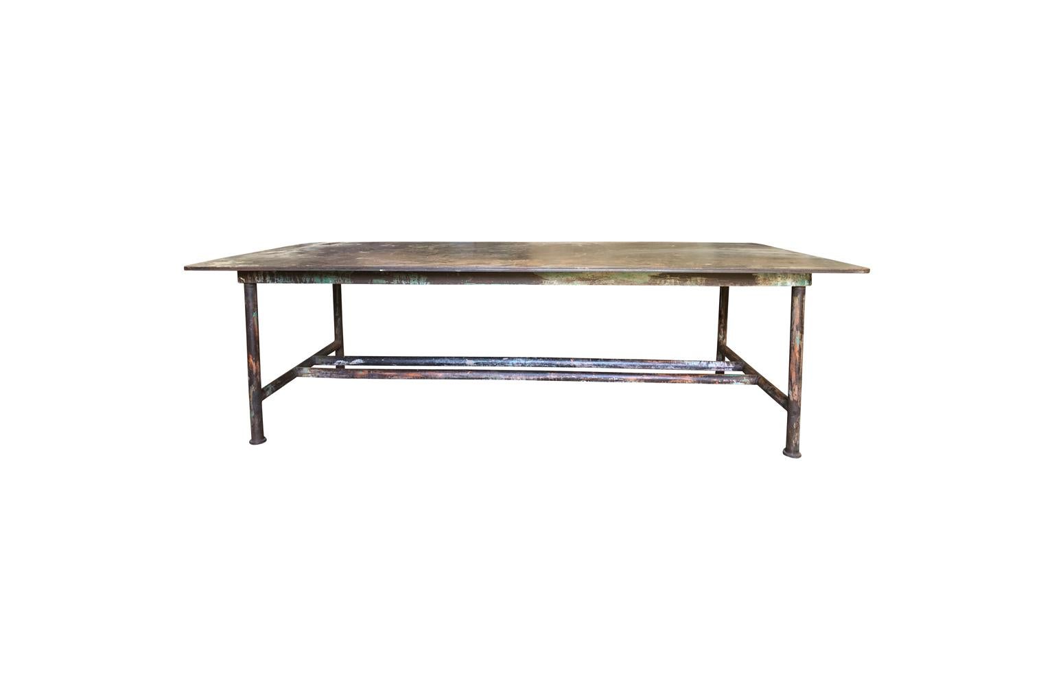 A terrific French early 20th century work table in iron. Super sturdy. Wonderful as a dining table as well.