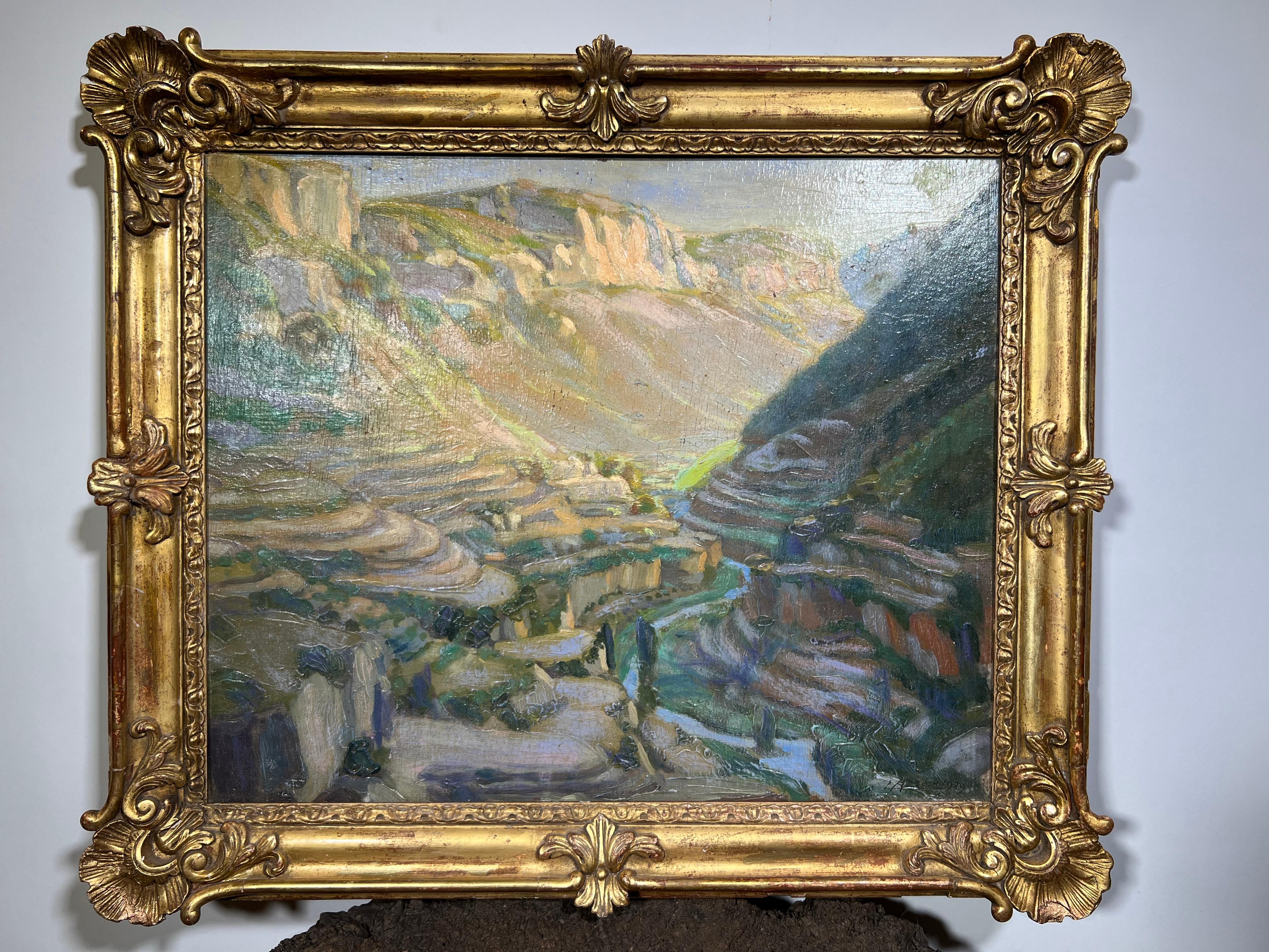 A very beautiful early 20th century landscape oil on board painting of the countryside in South West France. Expertly executed by Ernest Azema with bold brushwork and wonderful color. Housed in a giltwood frame.