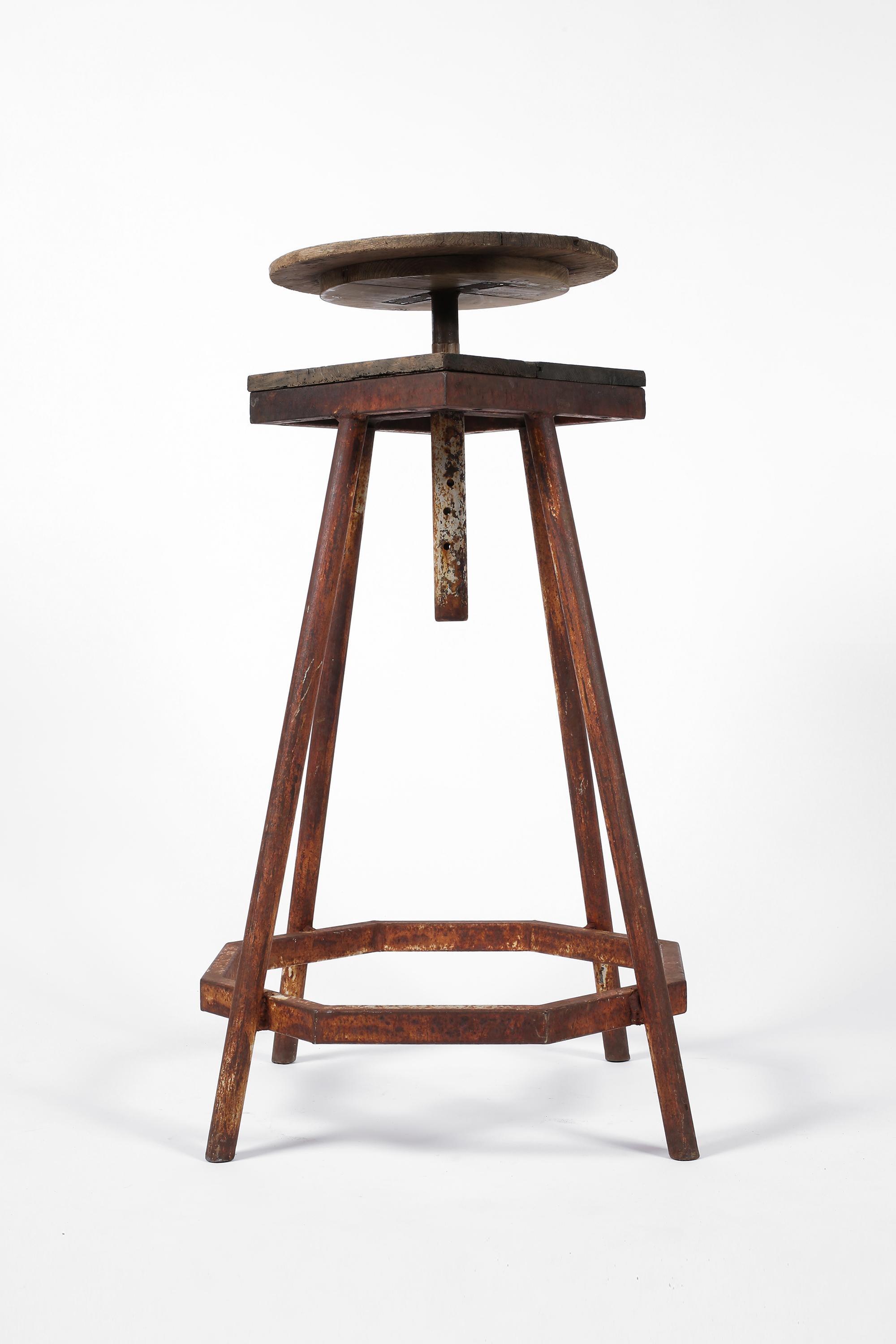 A large early 20th century artists sculpture modelling stand in pine with the most unusual octagonal, modernist base in welded iron. Likely a one-off, the timber is beautifully silvered and the geometric metalwork heavily patinated with remnants of