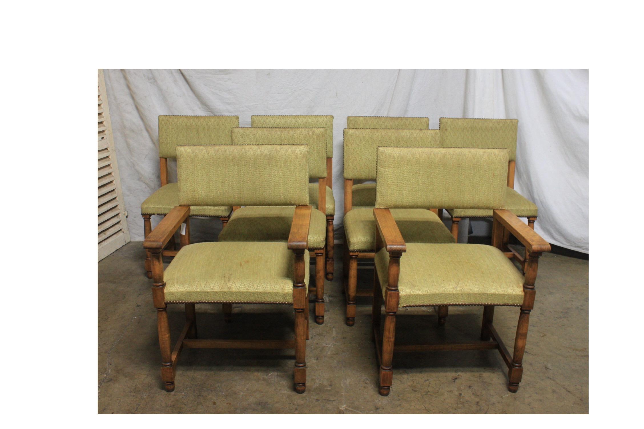 French early 20th century set of dining chairs and armchairs.

Dimensions of the pair of armchairs 23.25in. W x 18.5in. D x 35.25in. H (Seat 18in. H).