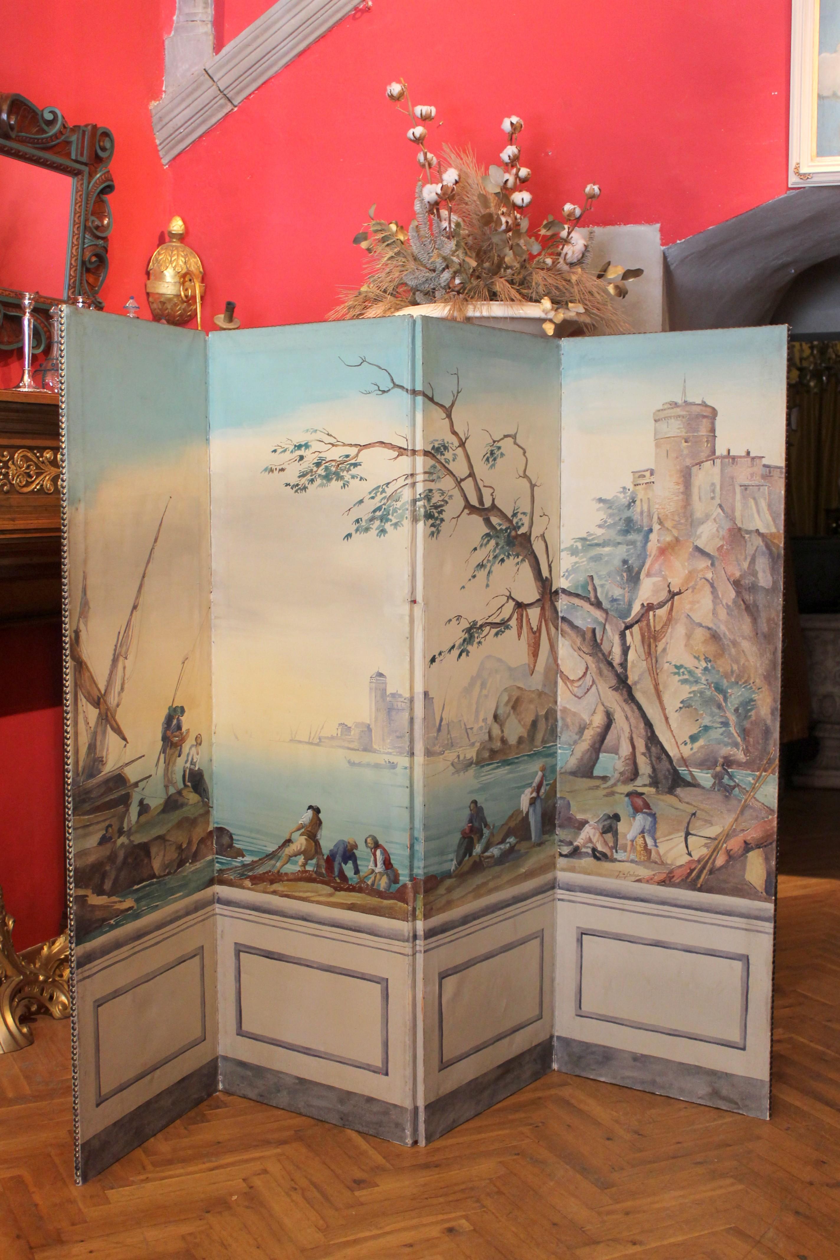 This French early 20th Century folding screen is made up of four canvases entirely painted with textured tempera featuring a marine landscape view in full Louis XV style, reminiscences of romantic atmospheres with certain moods from the past.
The