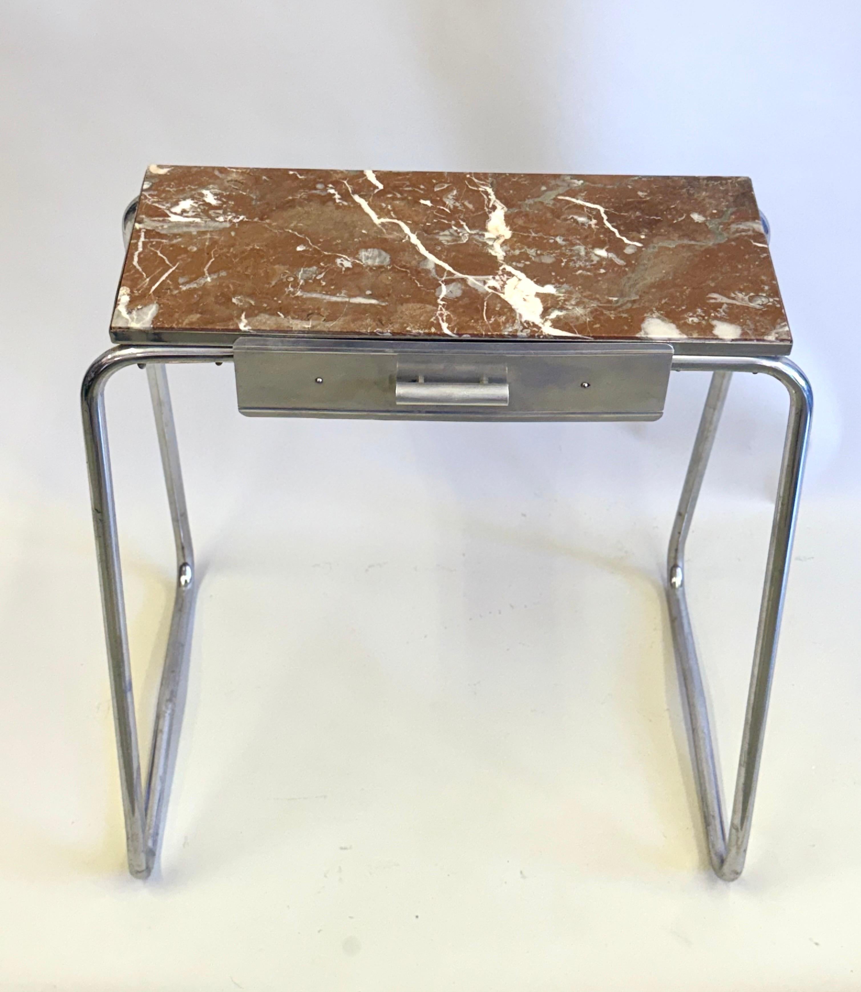 A Rare French Early Modernist Console / Vanity / Desk / Writing Table in Chromed Tubular Steel, Aluminum & Marble in the style of Robert Mallet-Stevens. The origin of this exquisite piece traces back to the beginnings of French Modernism in the late