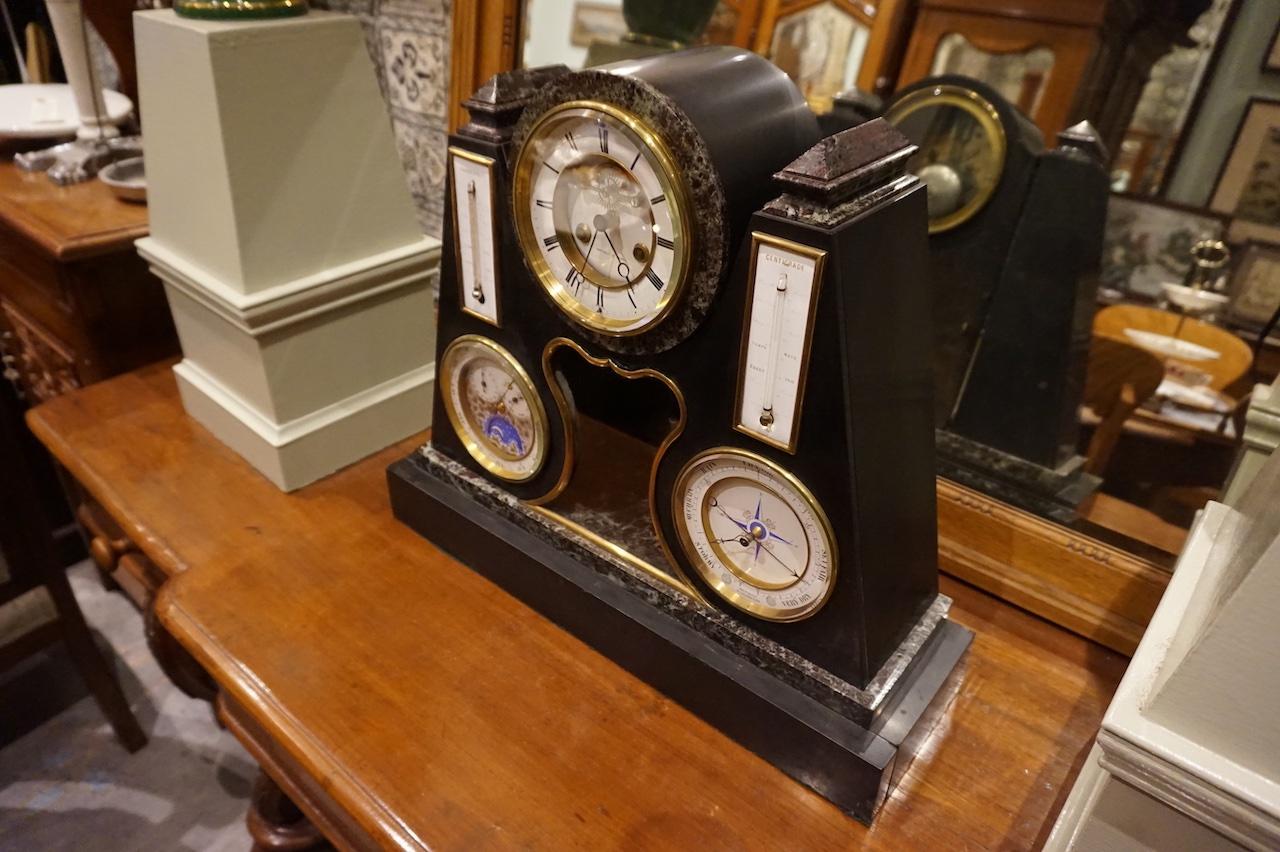 Brocot type suspension very rare early 30 day perpetual slander clock with moon phase, barometer and Fahrenheit and Centigrade thermometers. Strikes on bell. In running order but can benefit from professional service with regards moon phase. Stellar