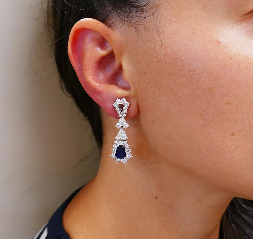 A pair of French earrings by Mouawad Jewelry, made in platinum and featuring sapphire and diamond.
An exquisite Mouawad drop earrings with mix cut diamond and sapphire, showcasing brand’s creativity and high-skilled workmanship.
The dangle earrings
