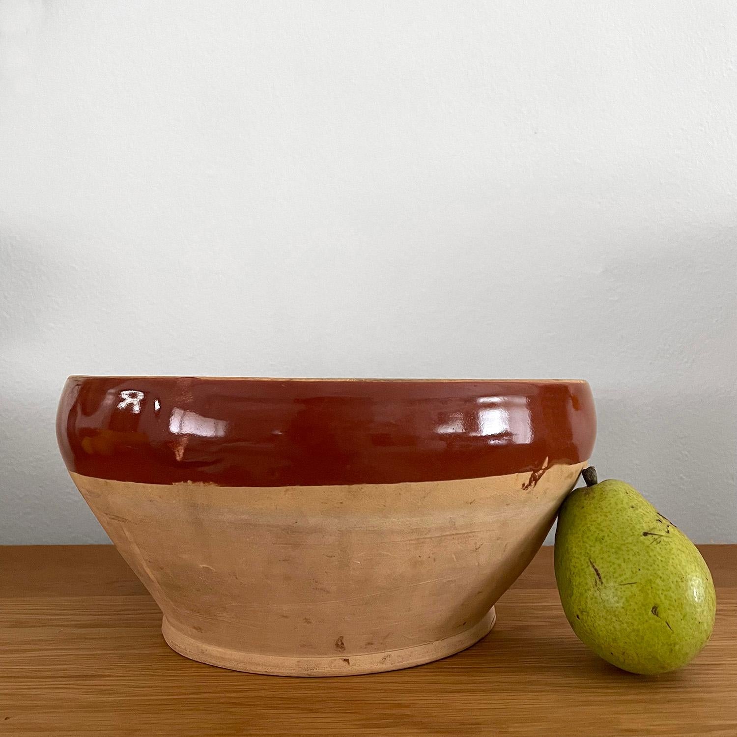French earthenware bowl
Organic texture and feel
Neutral toned ceramic bowl in a matte finish accented with a deep terracotta glazed band
Age related wear to the inner glazing and rim makes this piece perfectly imperfect
Patina from age and use