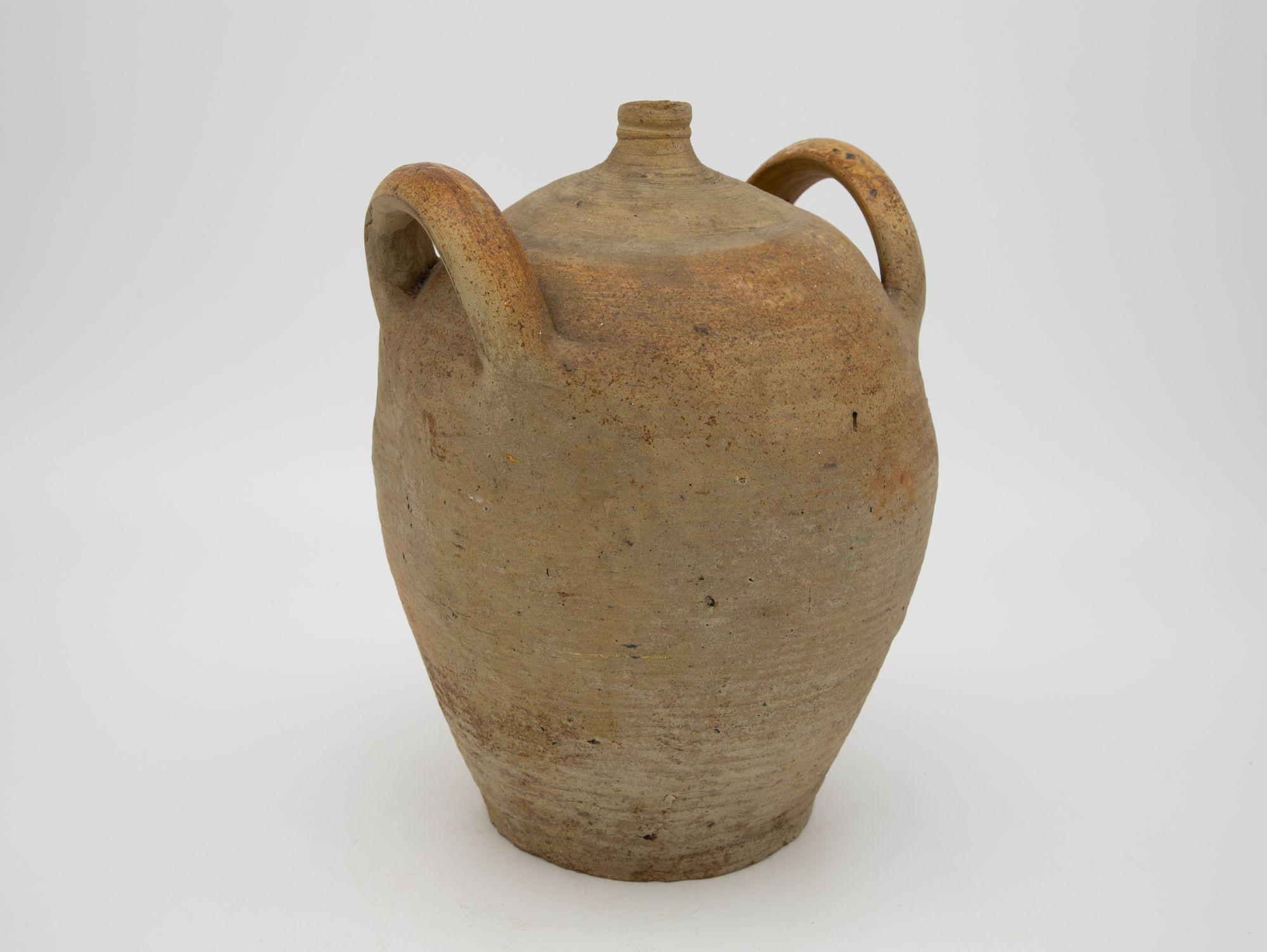 Late 19th century French earthenware pottery bottle or jug from Normandy. Originally used for water or cider.