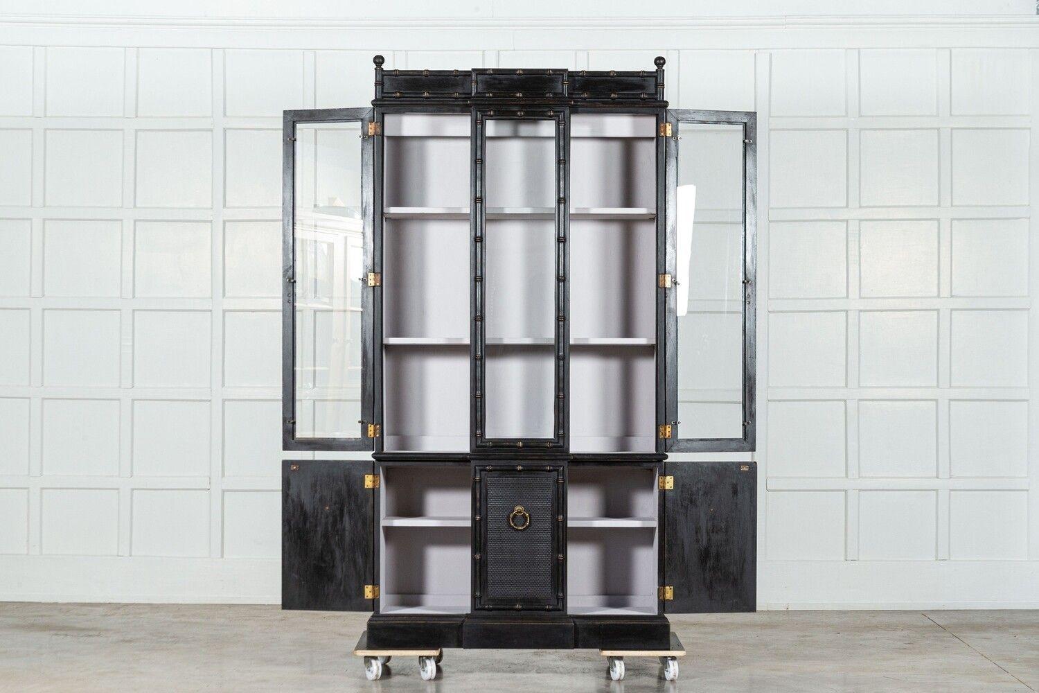 circa Mid 20thC
French Ebonised Faux Bamboo Beech Glazed Breakfront Bookcase / Vitrine
X1 cabinet left
sku 1775
(sku 1380)- Price is each
Base W104 x D36 x H65 cm
Top W104 x D36 x H145 cm
Together W104 x D36 x H210 cm
Weight 107 Kg