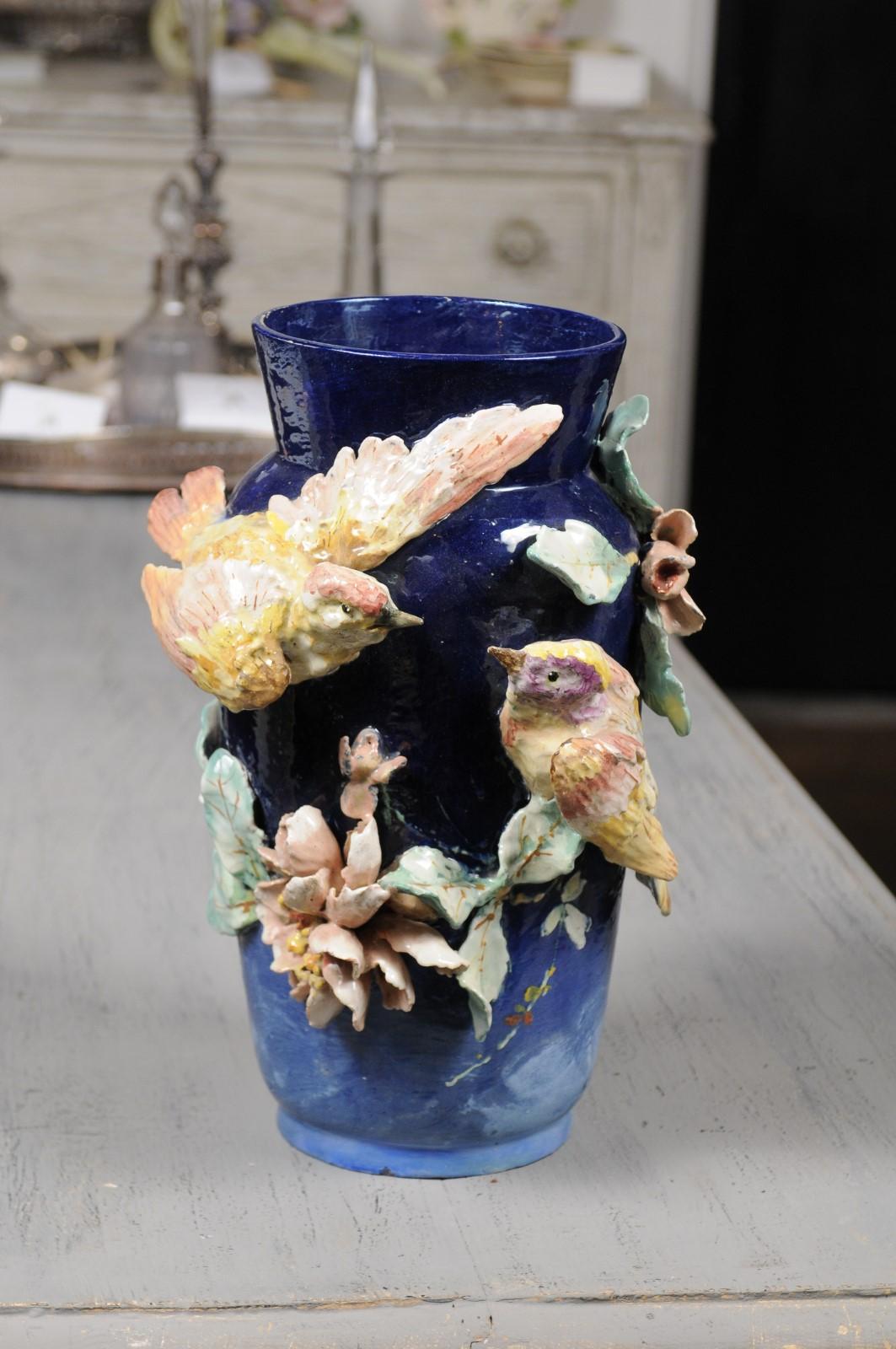 A French Ecole d'Auteuil Impressionist majolica vase from the late 19th century, with barbotine décor of birds and flowers. Created in the later years of the 19th century by a group of Impressionist ceramists located in the 16th arrondissement of