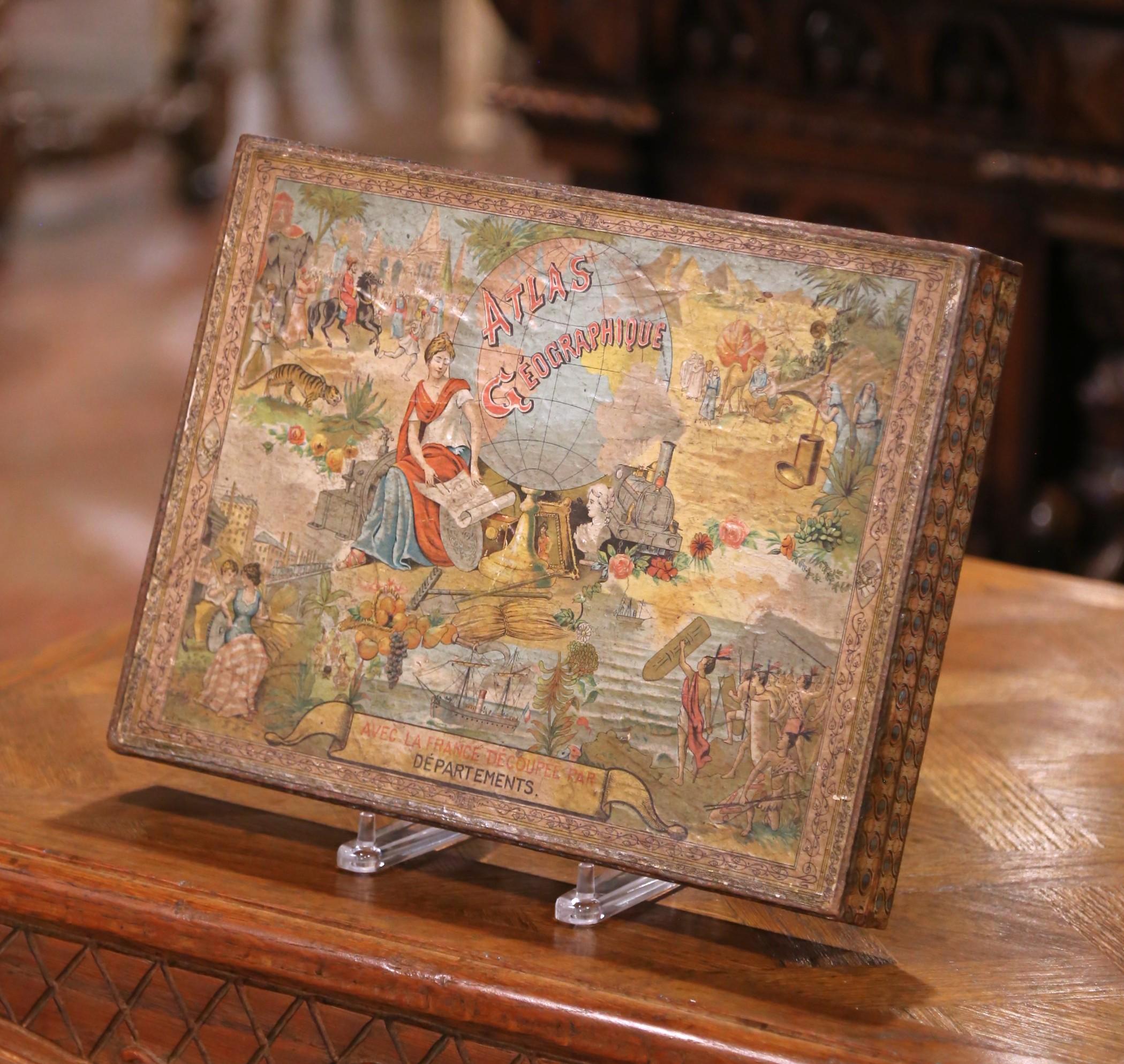 This early 20th century French educational game is presented in its original decorative box, titled Atlas Géographique. Printed in Paris by Imprimerie Dufrénoy and dated 5–03 (May 1903), the set was designed to teach geography through engaging