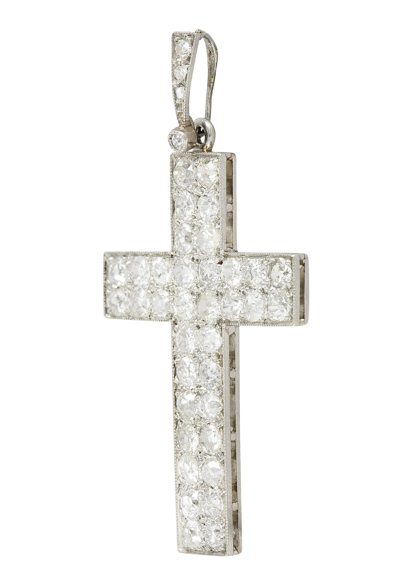 Pendant is designed as a cross pavè set throughout by old European cut diamonds

With a stylized milgrain bale also accented by old European cut diamonds

Weighing in total approximately 3.50 carats with H to K color with SI2 clarity

French maker's