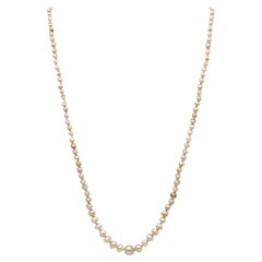 Collar Francés Eduardiano de Perlas Naturales en Oro de 18 Kt con Diamantes y Rubí