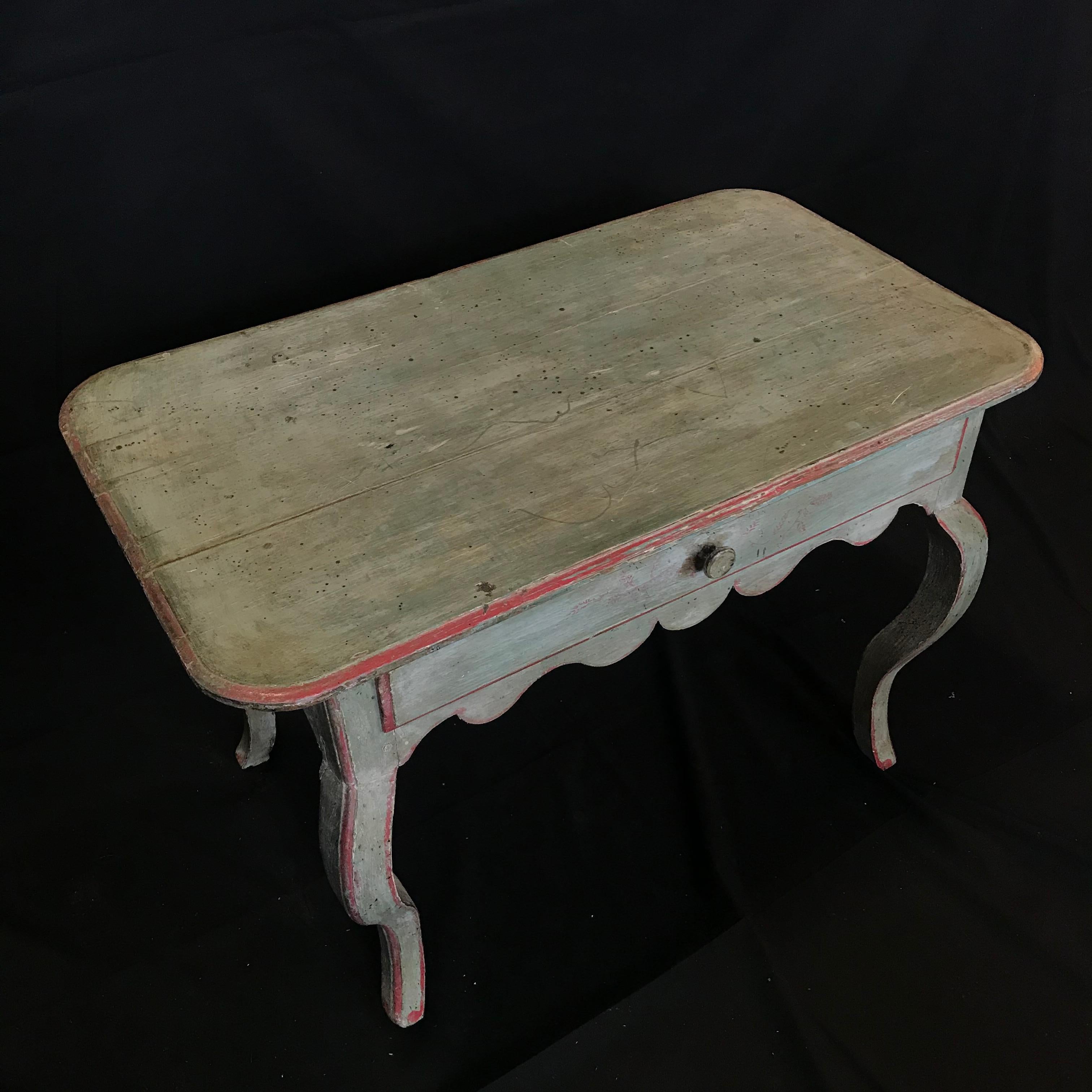 Versatile French country side table or nightstand with eggshell blue paint, red detailing and gorgeous patina. Single drawer.
#1428
 H skirt 19.25”.
