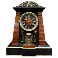 French Egyptian Revival Patinated Bronze and Marble Mantle Clock
