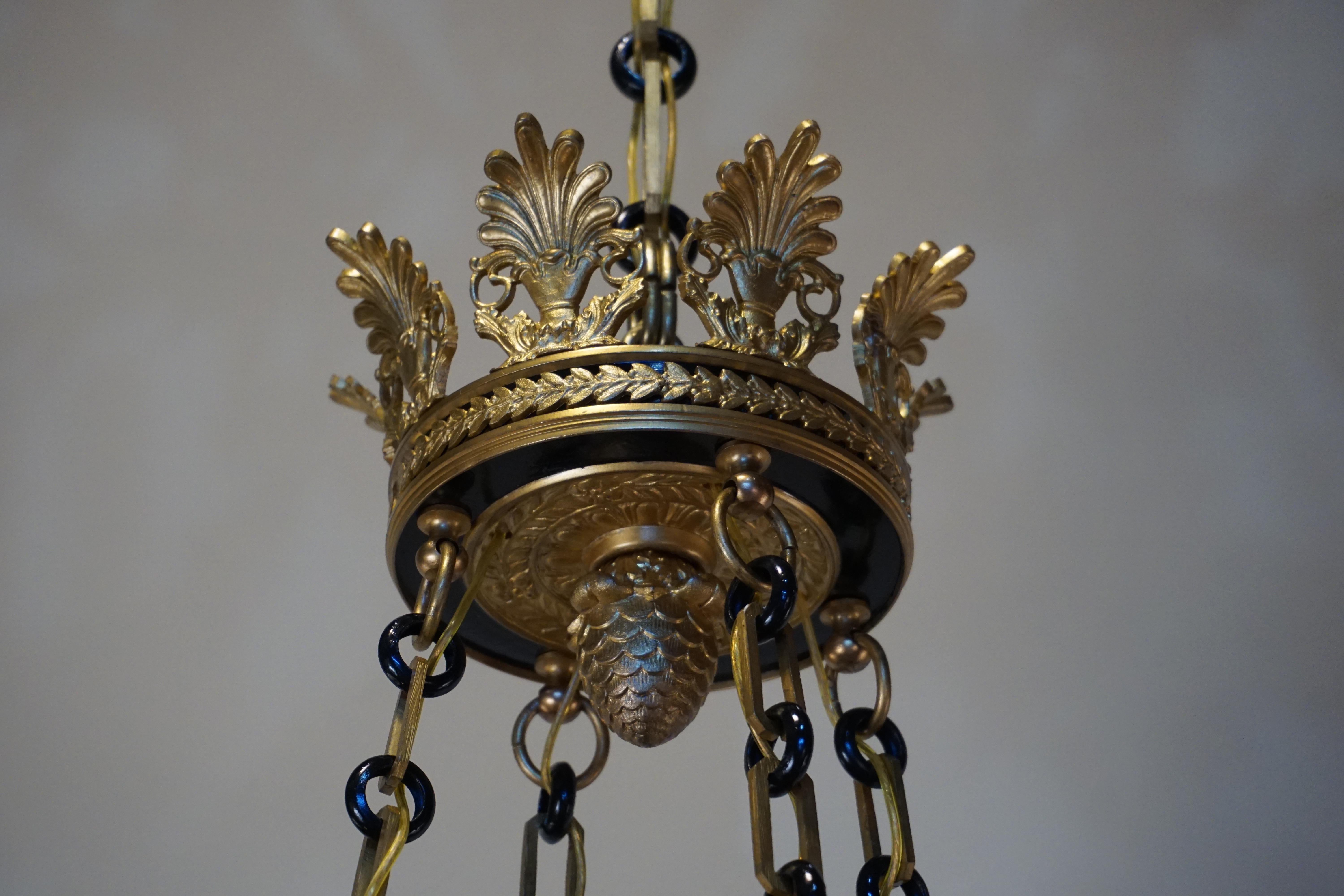 Early 20th Century French Eight-Arm Empire Style Bronze Chandelier