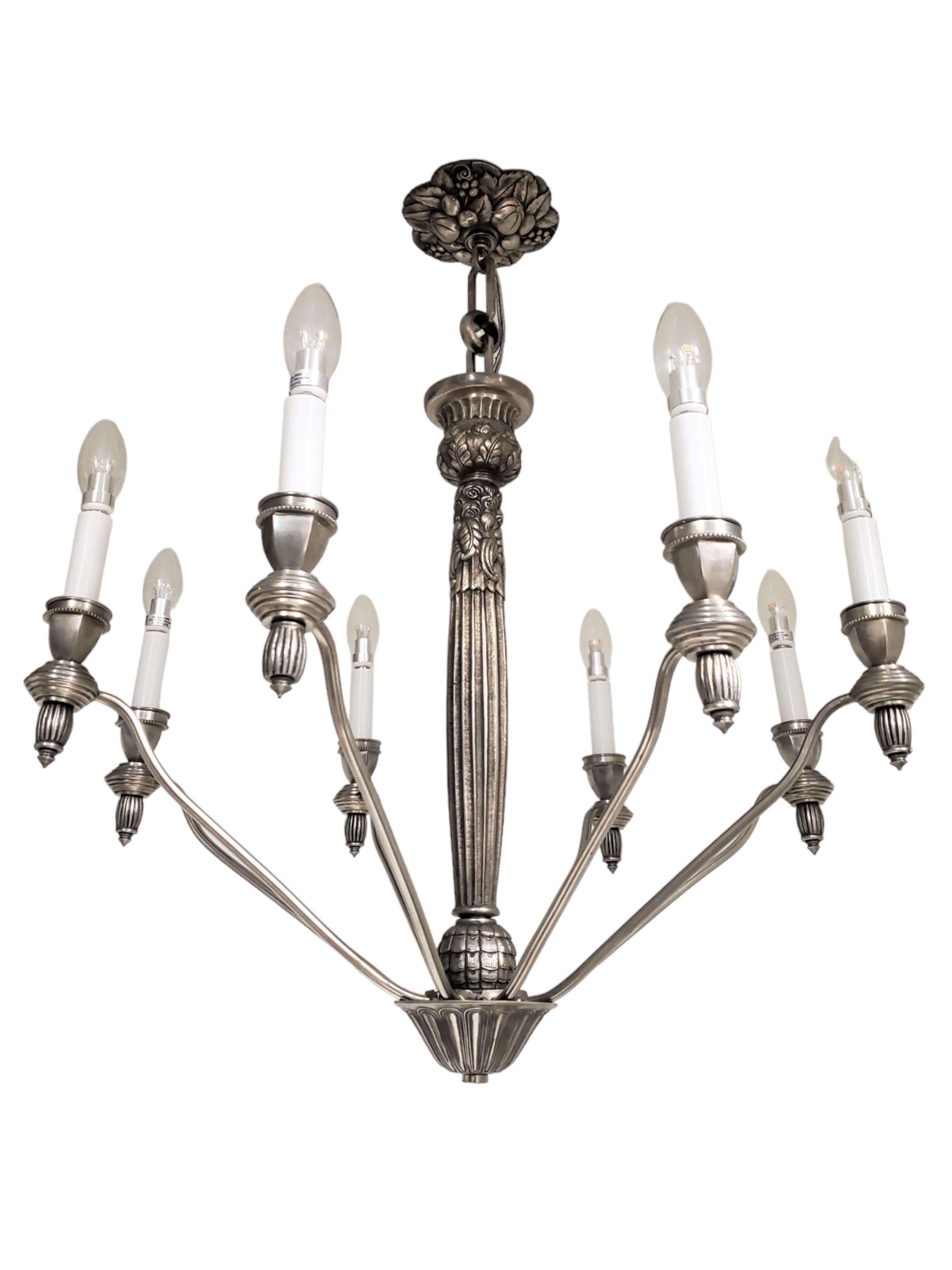 Art Deco French eight arm heavily cast and detailed nickeled bronze chandelier - G.Capon  For Sale