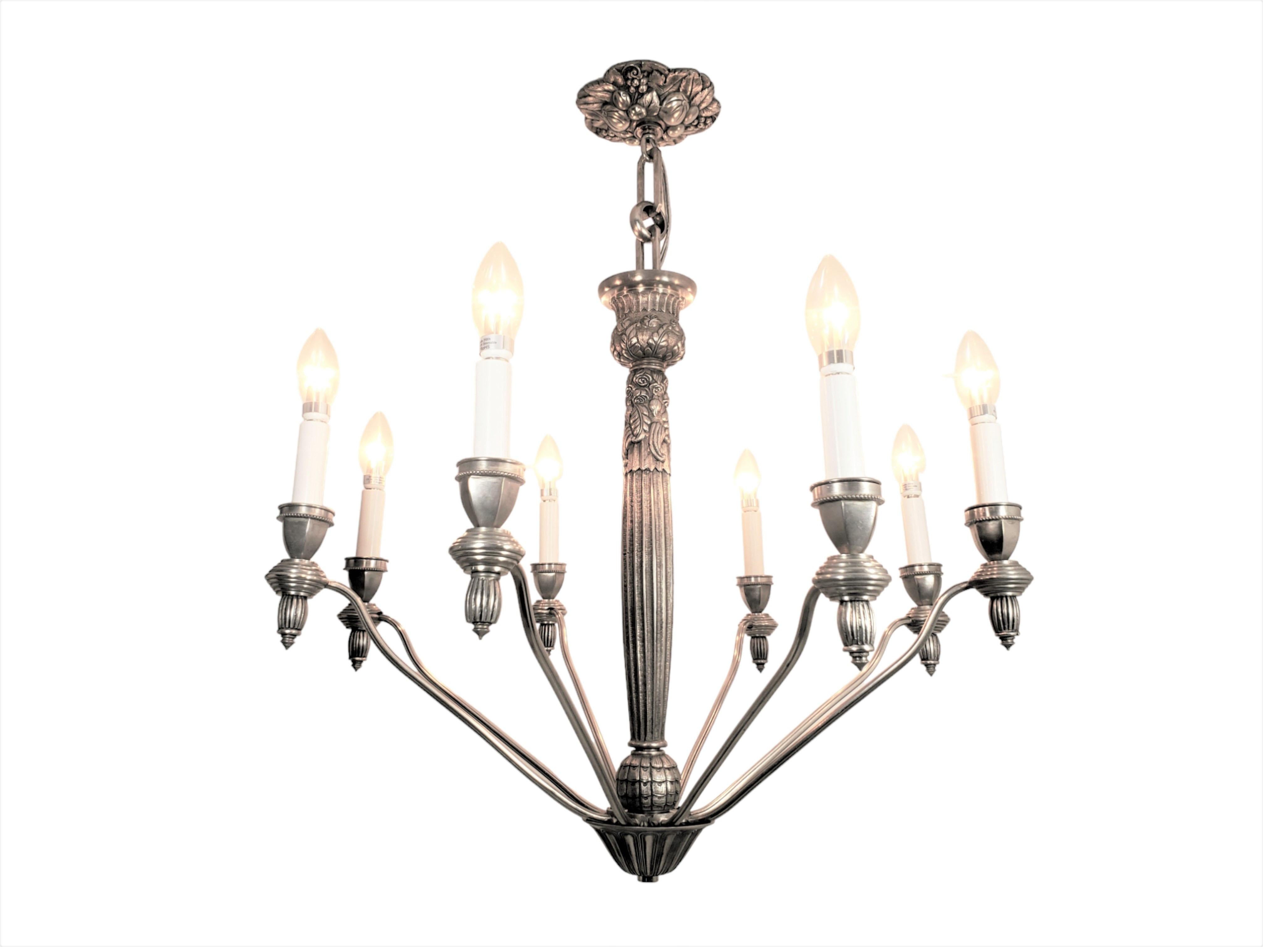 20th Century French eight arm heavily cast and detailed nickeled bronze chandelier - G.Capon  For Sale