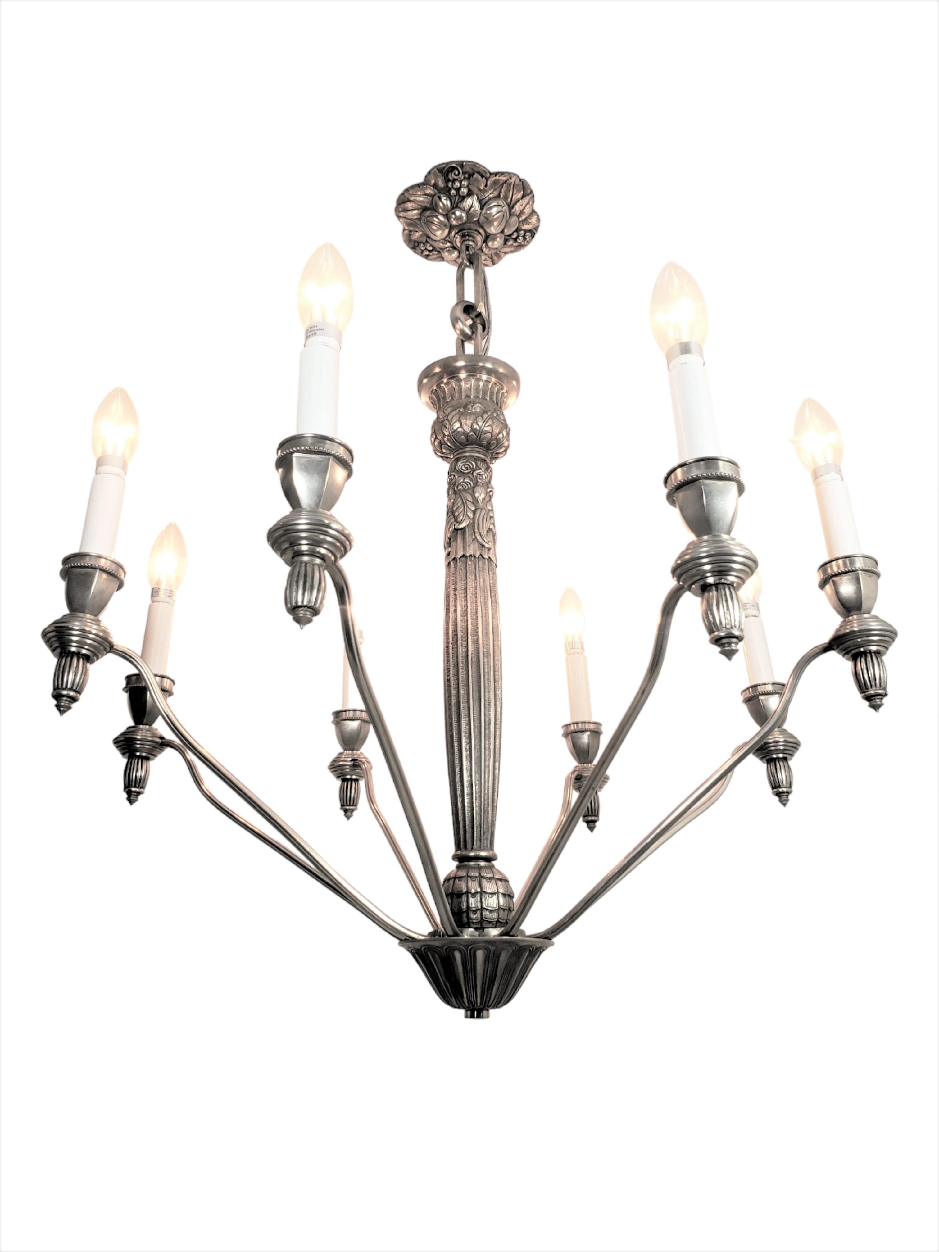 Bronze French eight arm heavily cast and detailed nickeled bronze chandelier - G.Capon  For Sale