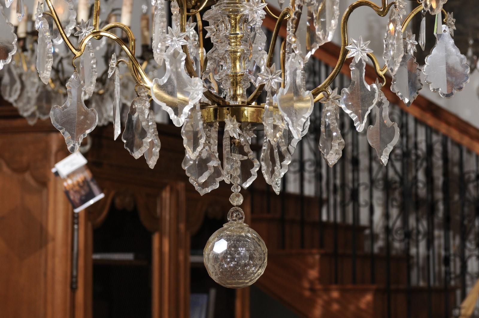 20th Century French Eight Light Crystal Chandelier with Gilt Metal Armature and Pendeloques For Sale