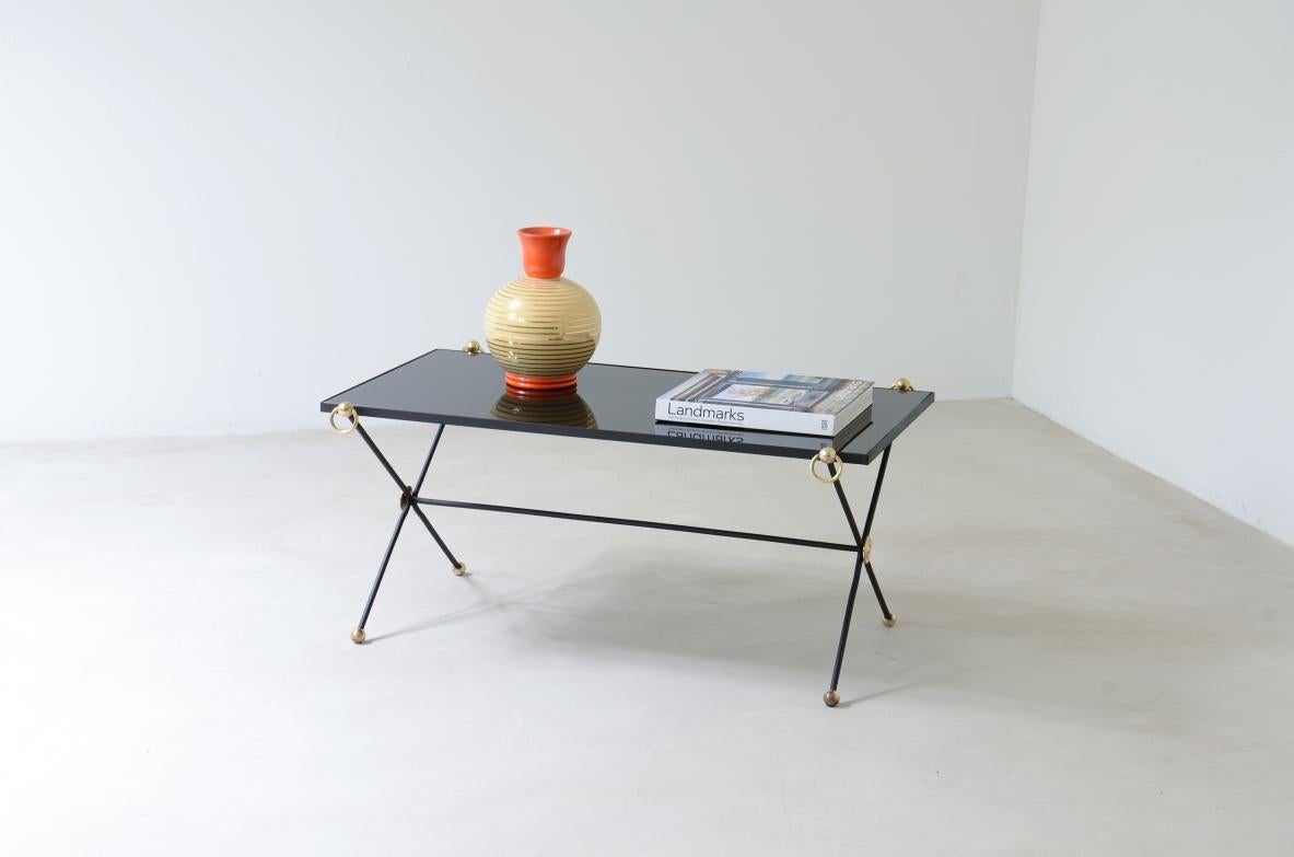 COD-2698
Elegant coffee table in turned iron and brass with black opaline glass top.

French manufacture, Maison Jansen around 1950.

90x45xh40cm