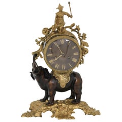 French Elephant Form Chinoiserie Patinated and Gilt Bronze Mantel Clock