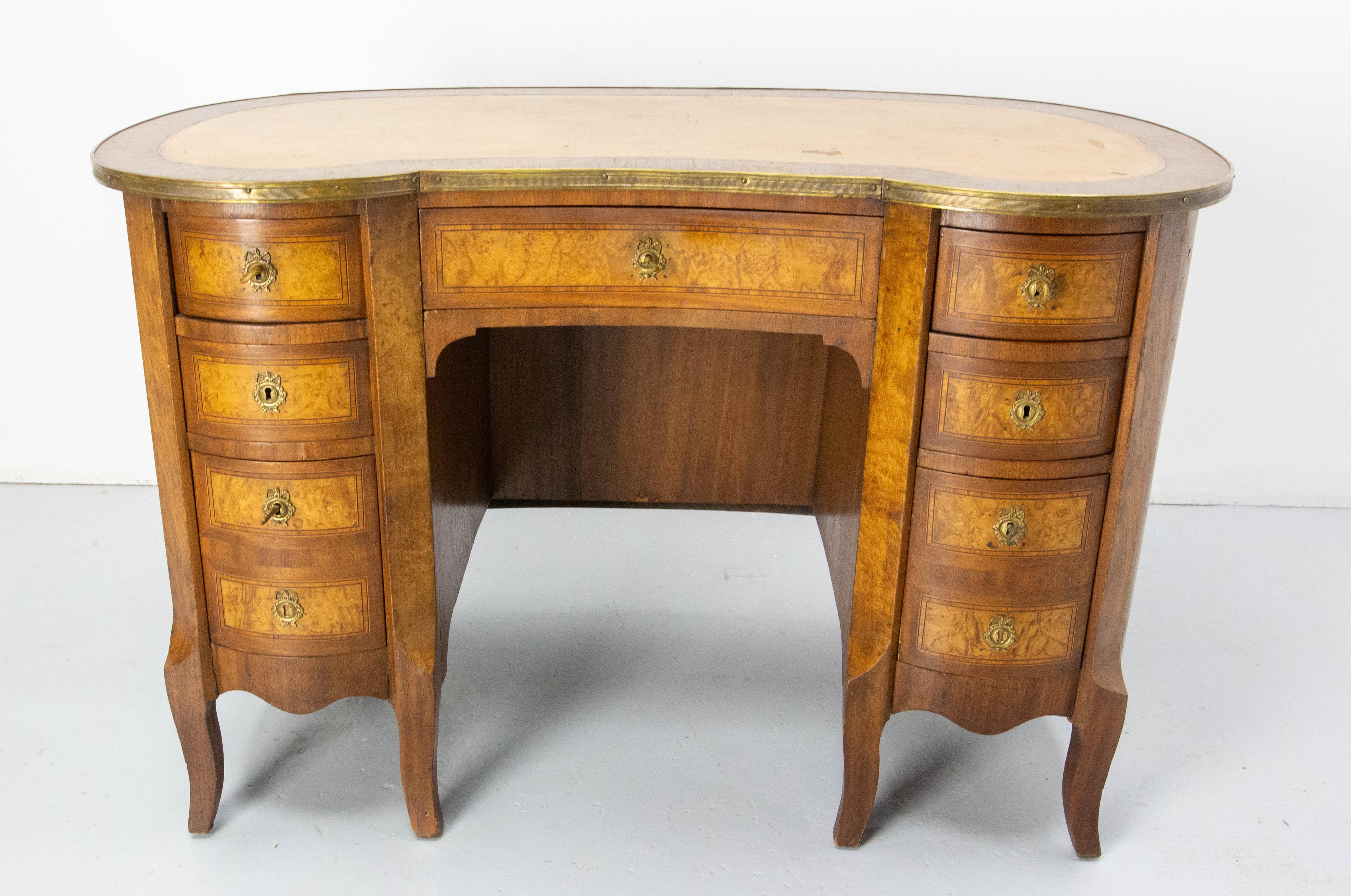 Desk in the kidney style. This shape of tops on the furnitures is typical of the 18th century. It is found in the Louis XV style with curved legs and in the Louis XVI style with straight legs.
In France, during the 60's furniture styles from many