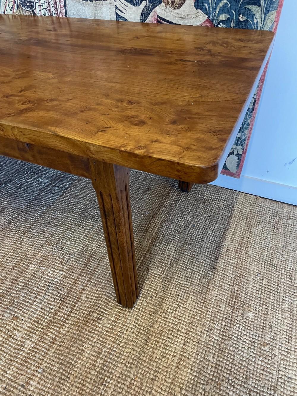 Stunning example of an early 20th century elm farmhouse table
The thick planked top standing on reeded legs
Great colour and wonderful figuring to the timbers
French circa 1900
Will seat 8 comfortably
H: 78 cm (30 11/16