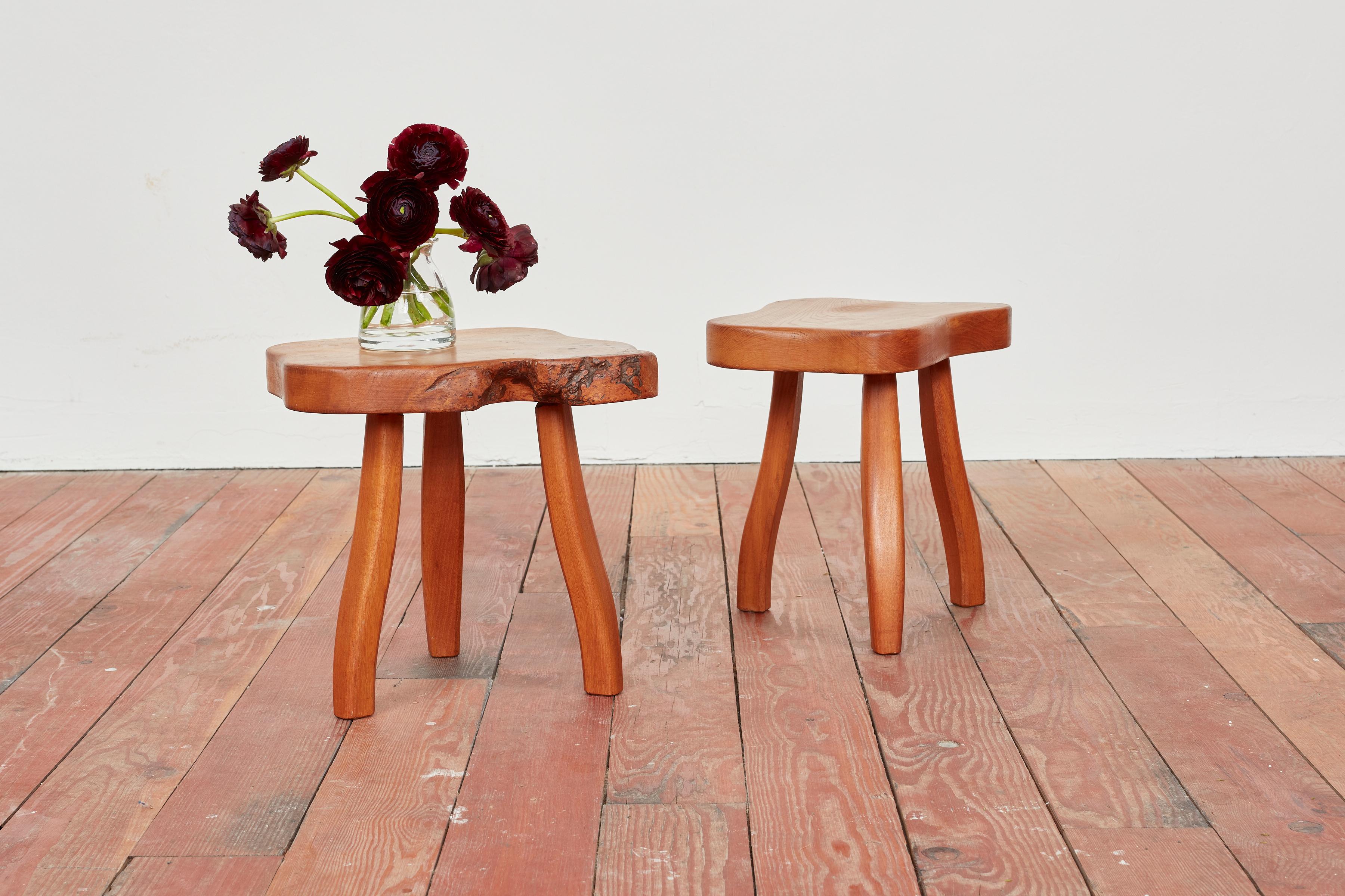 Pair of French Elm tripod stools 
Thick brutalist wood with wonderful patina and raw edges
Priced individually.