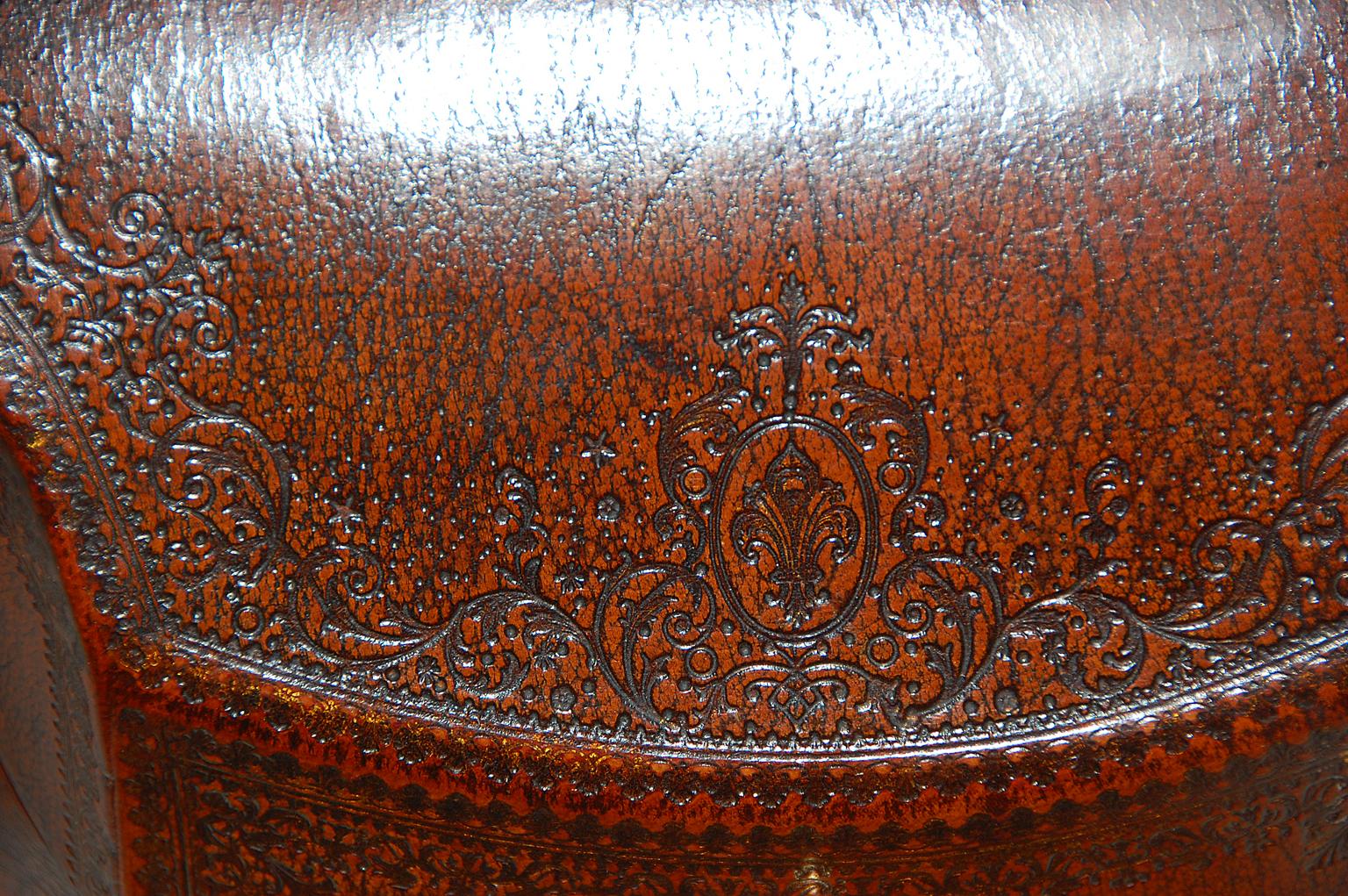 French embossed leather stationery or letter box with slanting lid and serpentine shaped base is signed by its maker Dreyfous (impressed on the back lower edge 