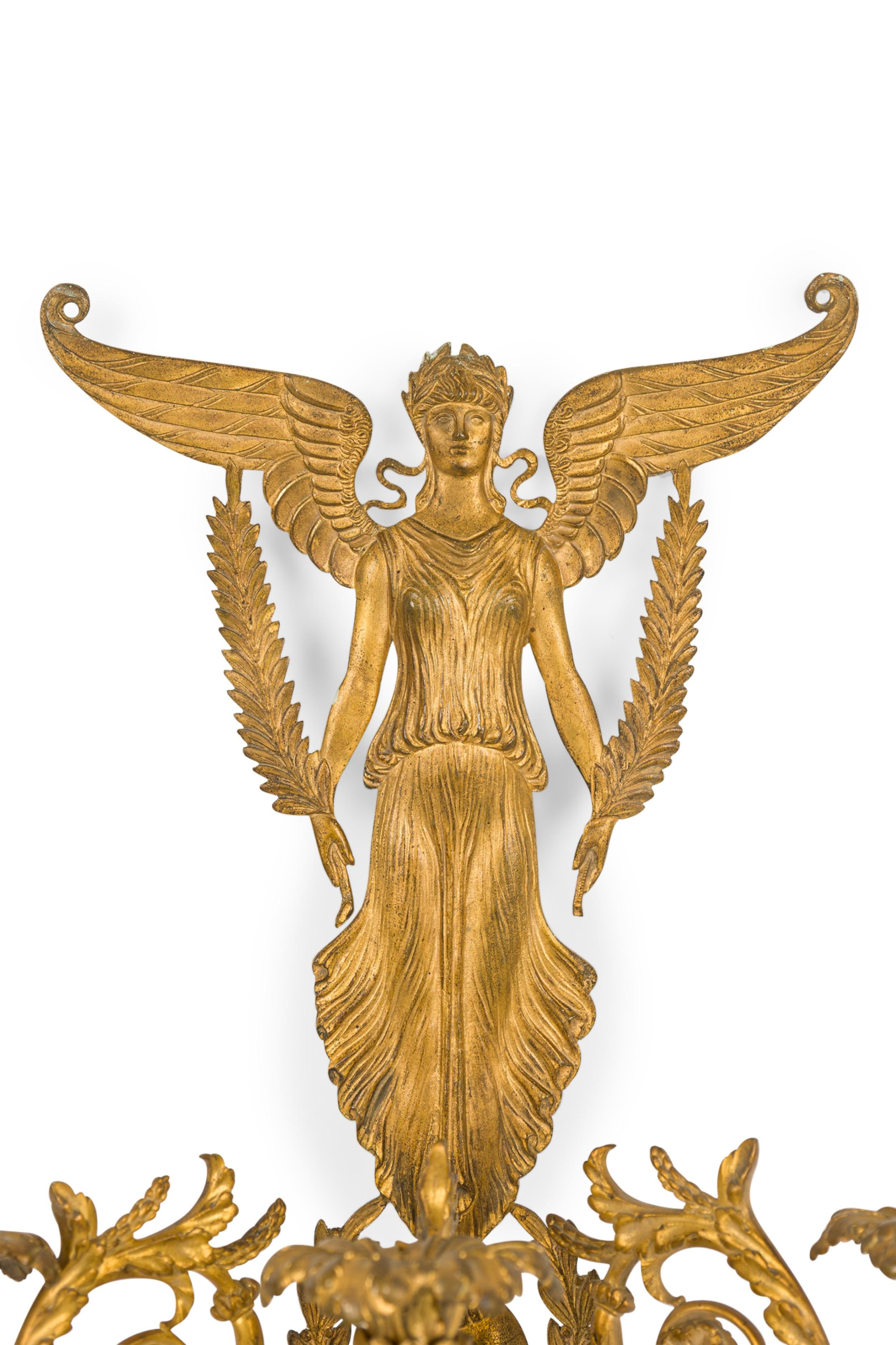 French Empire 3-Arm Gilt Bronze Wall Sconce With A Winged Figure In Good Condition For Sale In Queens, NY