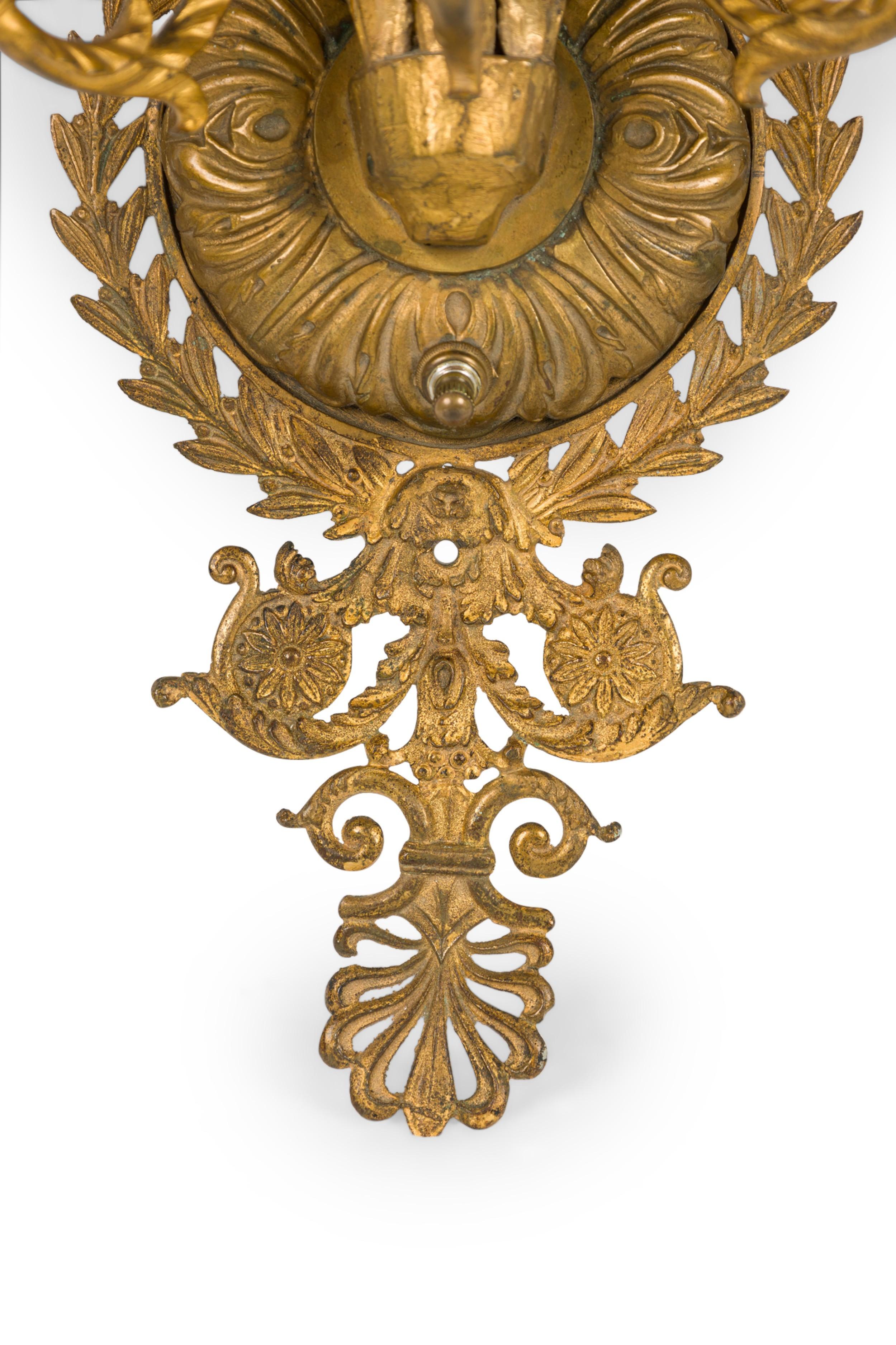 19th Century French Empire 3-Arm Gilt Bronze Wall Sconce With A Winged Figure For Sale
