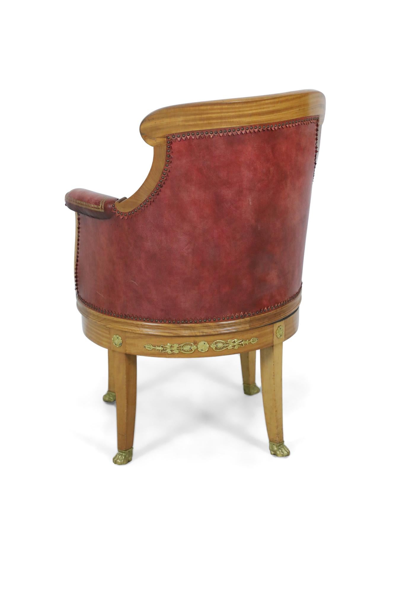 19th Century French Empire Blond Mahogany Swivel Leather Chair with Bronze Trim For Sale