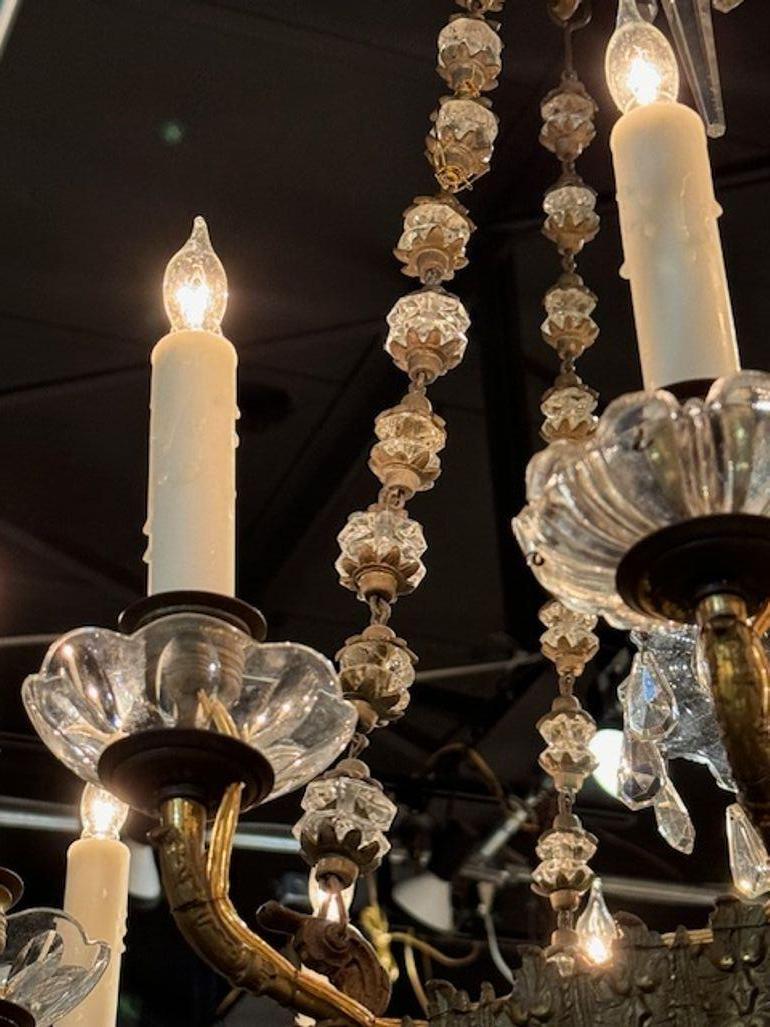 Lustre Empire français à 12 éclairages en bronze et cristal en vente 1