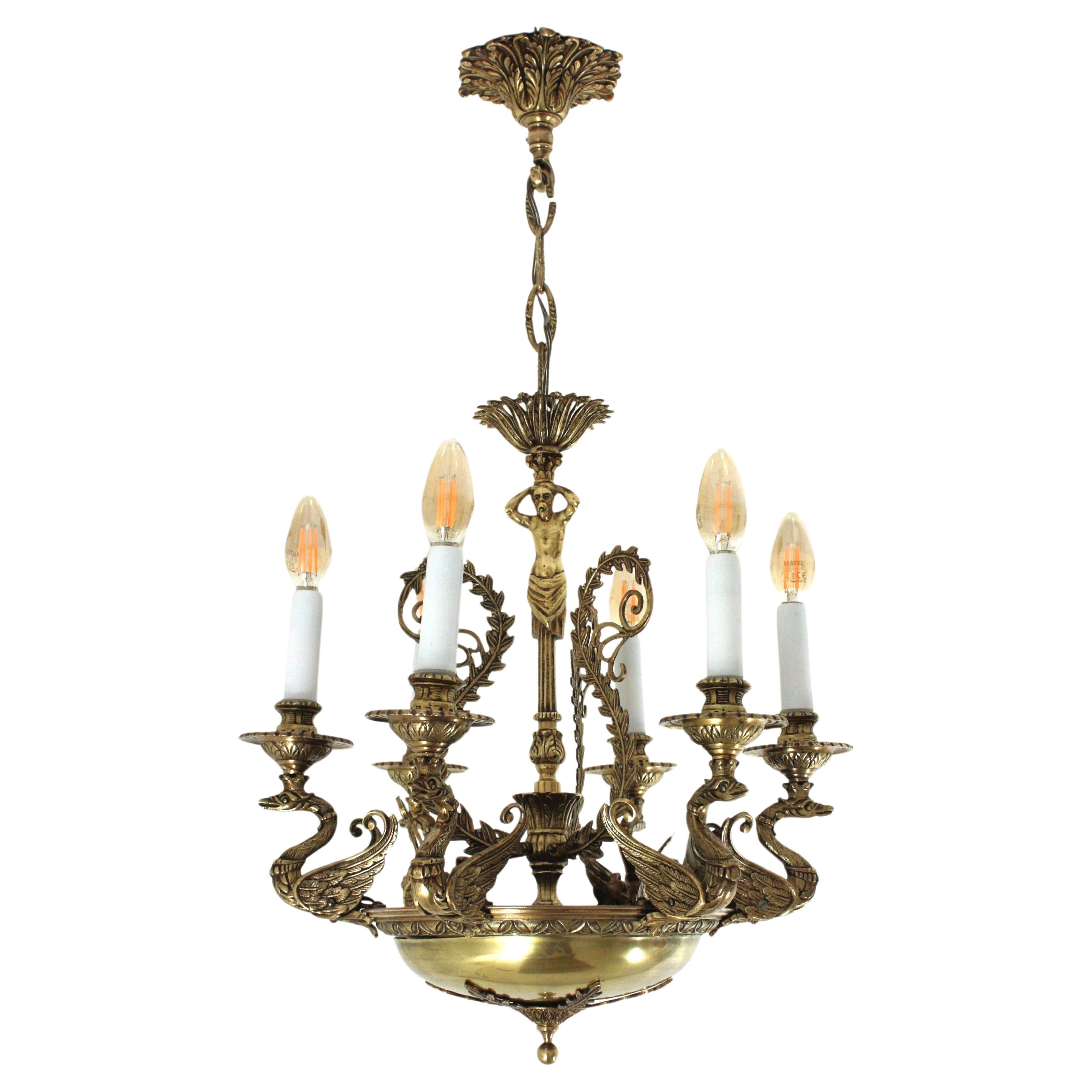Very Fine Empire Style Neoclassical Six-Arm Bronze Swan Chandelier, France, 1930s
Gorgeous six lights bronze chandelier with foliage and figural motifs.
Rare French Empire style bronze tole chandelier with six arms featuring flying swans details,