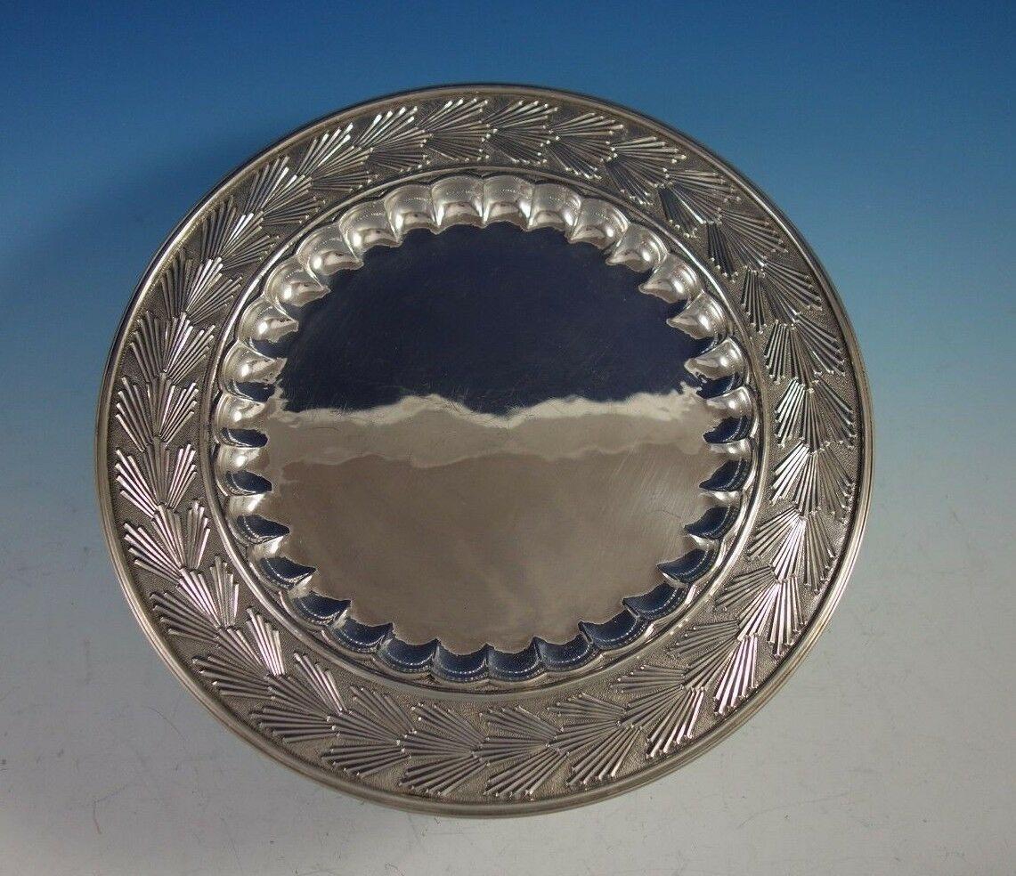 French Empire by Buccellati

Spectacular French Empire by Buccellati sterling silver entree serving dish / plate. This piece features a wide border of leaves and pine needles.

The plate / dish measures 5/8