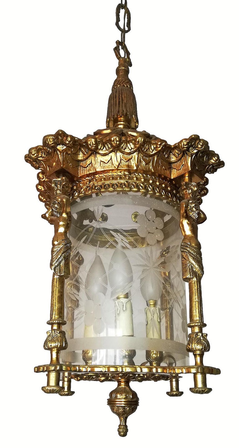 Beautiful pair of antique large French Empire cast bronze lanterns. Fire gilded solid heavy bronze and cut glass shade with four-light.
Measures:
Diameter 12 in/ 30 cm
Height 32 in/ 80 cm
Weight 12 Kg / 25 lb
Four-light bulbs E-14 / good working