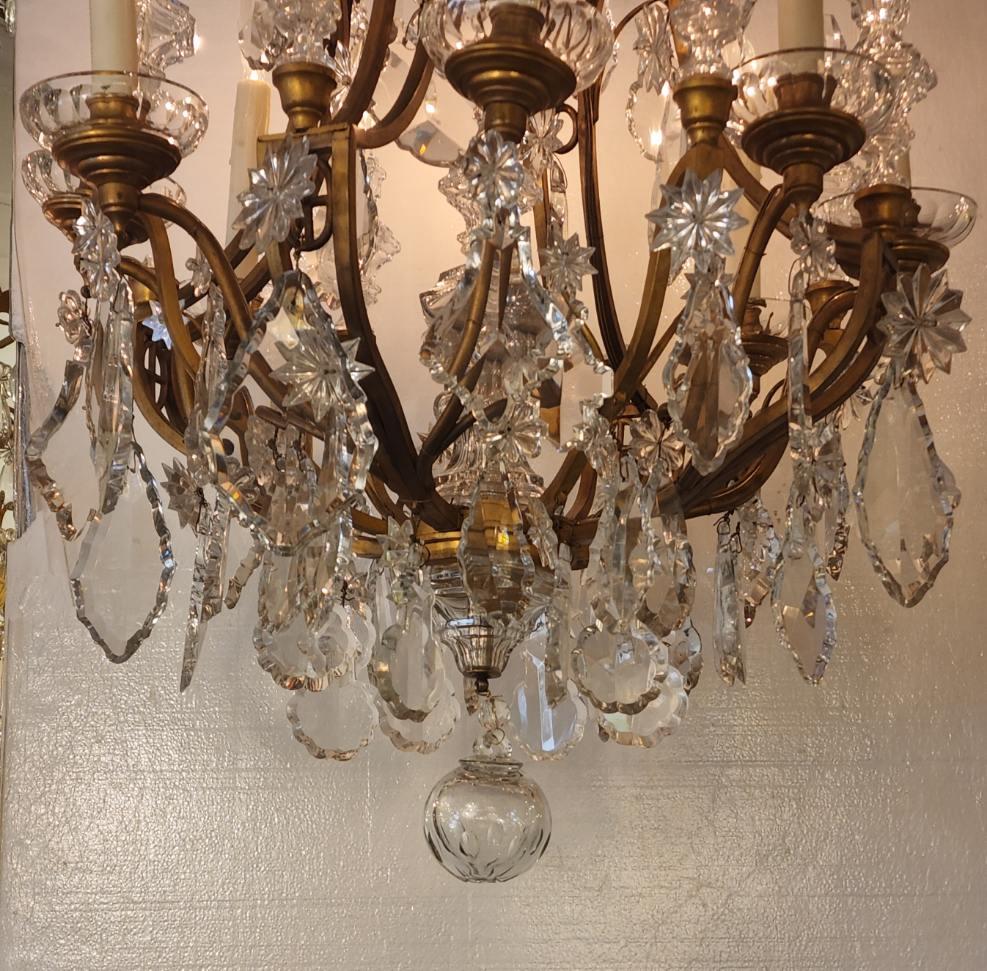 Beautiful French chandelier, made with bronze and brass material. Rewired and ready to hang.  