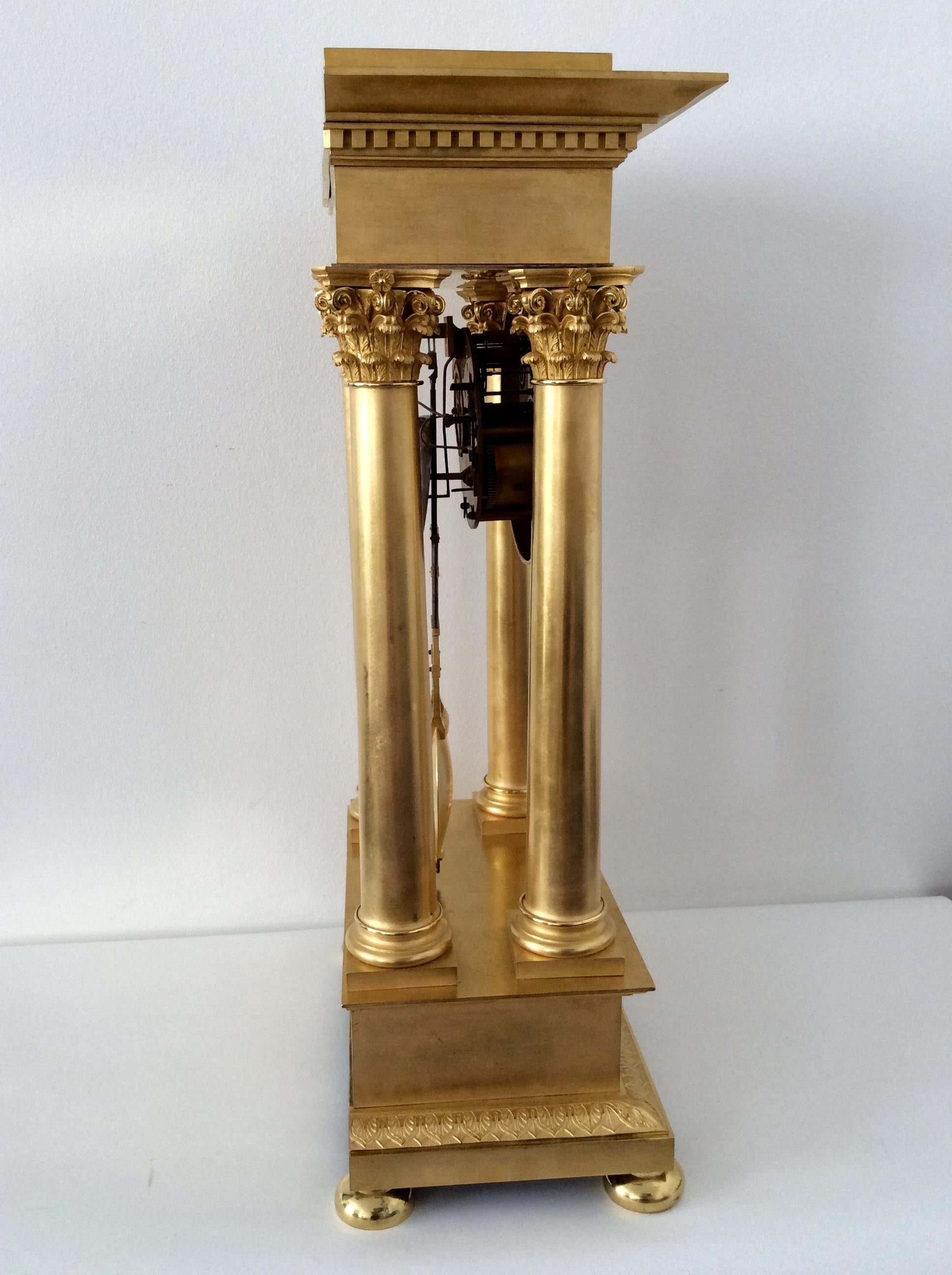 A large French Empire portico mantel regulator, circa 1810 very nice gilded, supported by Roman Corinthian columns, marked on dial
LeRoy Du Roi a Paris. Very nice.